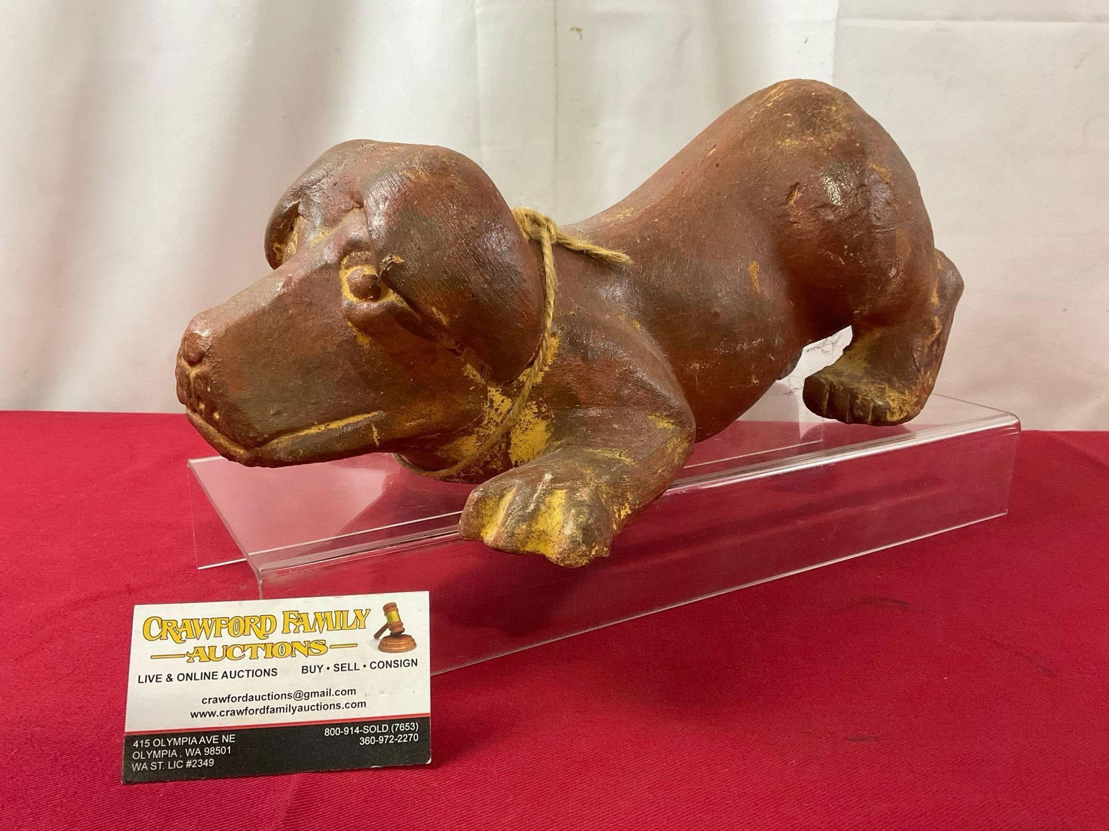 Vintage Pottery Dog Statue w/ Rope Collar, approx 7h x 15L x 9w inches: In sort of a sprawled pose, painted brown, with some details. Appears to be in good shape. The piece measures approx 7h x 15L x 9w inches. See pics. E-3860