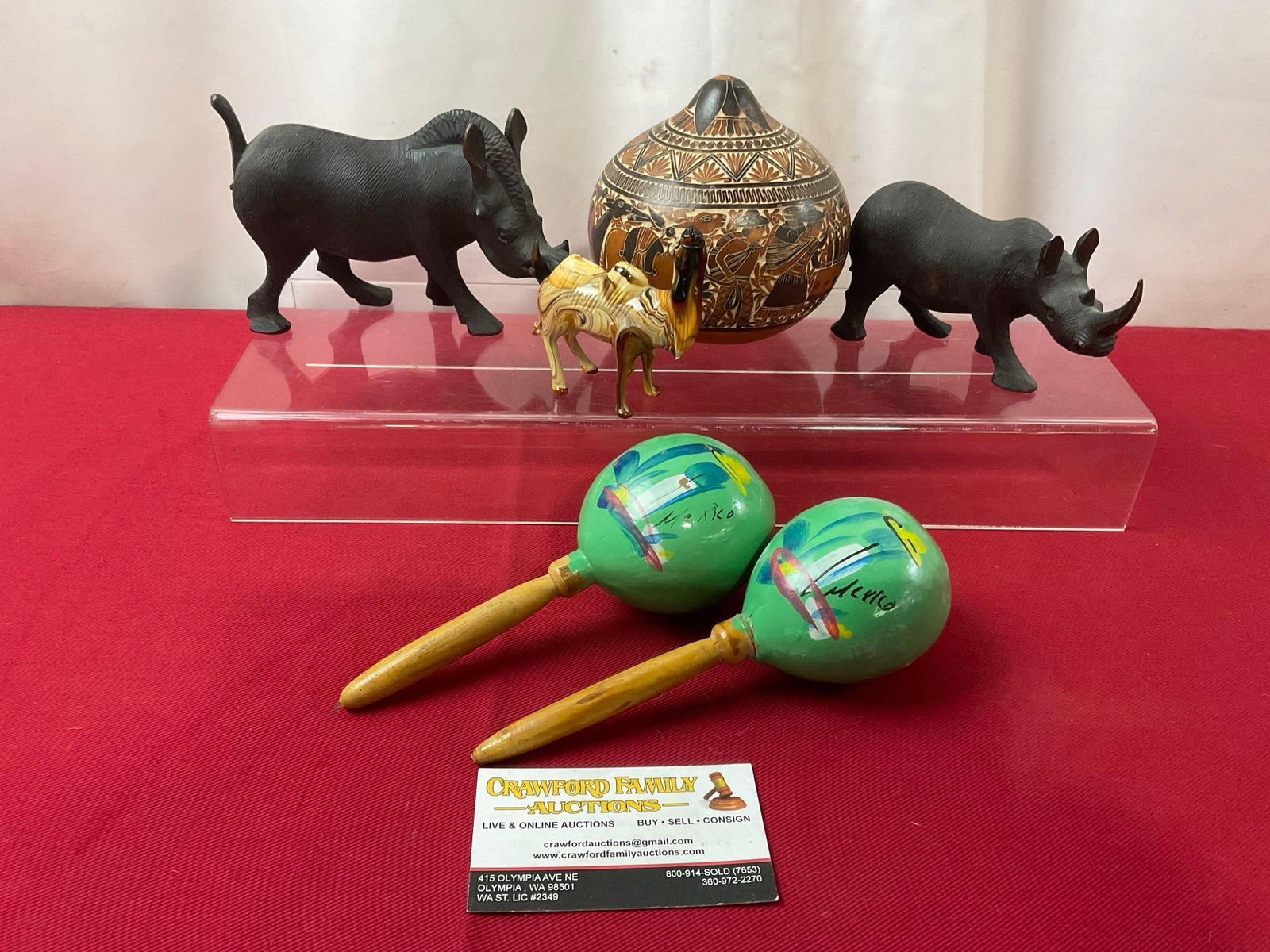 Pair of Mexican Maracas, carved Warthog & Rhino pieces, Slag Glass Camel, & Ornately Carved Gourd: Appears to be in good shape. The carved gourd piece measures approx 3.5 inches in diameter. See pics. E-3880