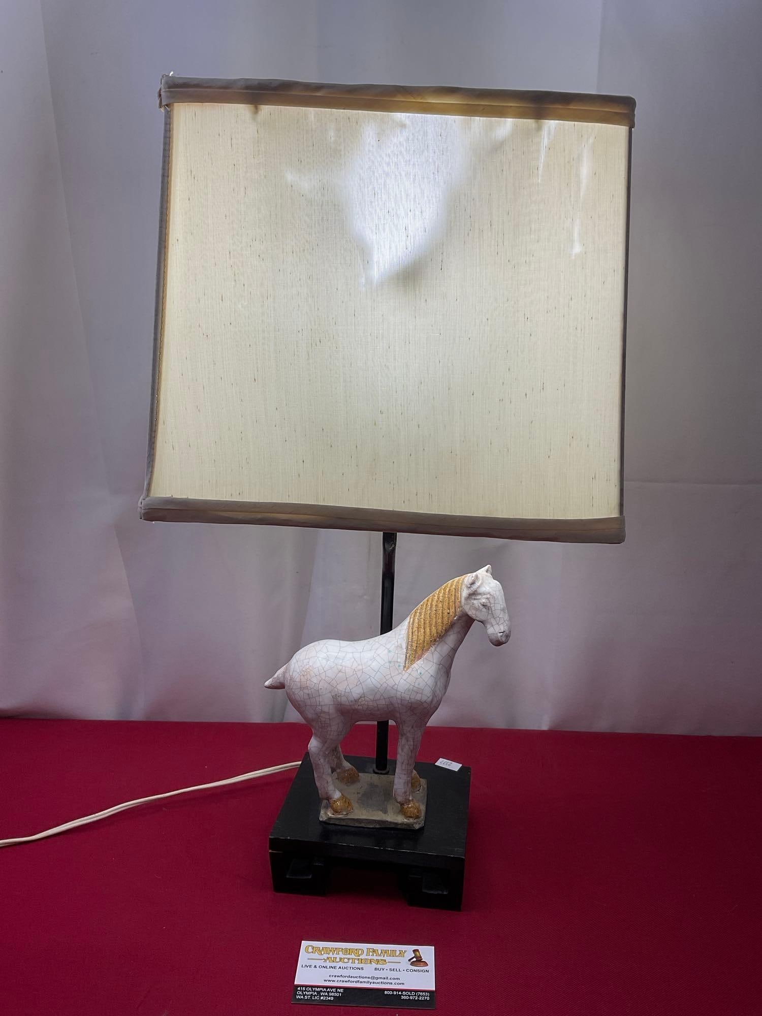 Ceramic White Horse Lamp, 21 inches tall, tested and working: The shade has some damage. The rest of the lamp appears to be in good shape, tested and working. The piece is approx 21 inches tall. See pics. E-2377