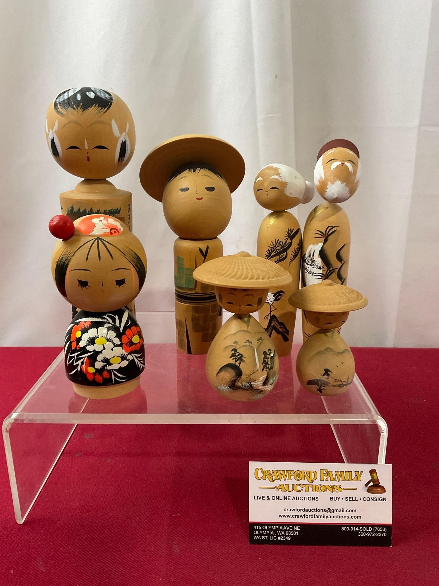 Collection of 7 Japanese Wooden Kokeshi Dolls, handpainted details, tallest is 8 inches: Appears to be in good shape. The tallest piece measures approx 8 inches. See pics. E-3980