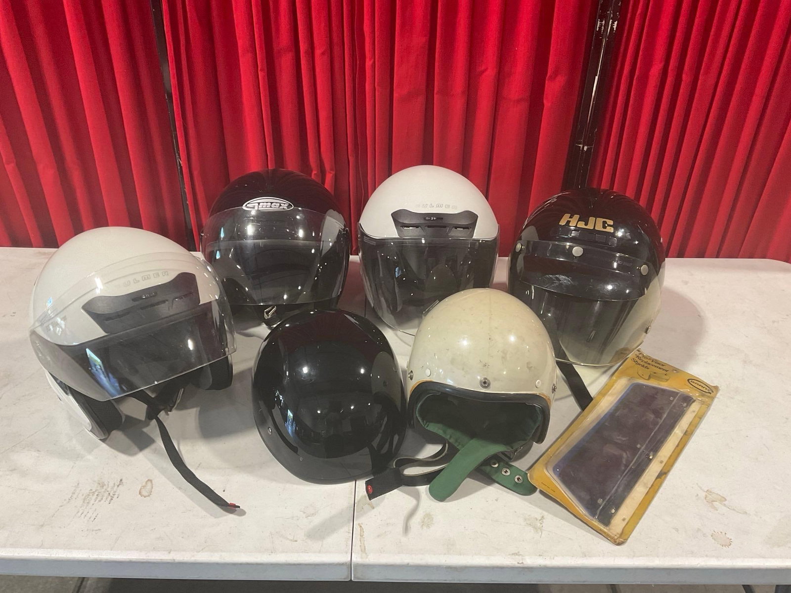 6 Motorcycle Helmets, HJC, GMax, 2 Fulmer, Romer & 1 more, some wear: Appears to be in fair to good shape. All fits in a box that measures approx 22h x 20w x 18.5d inches. See pics. E-2684