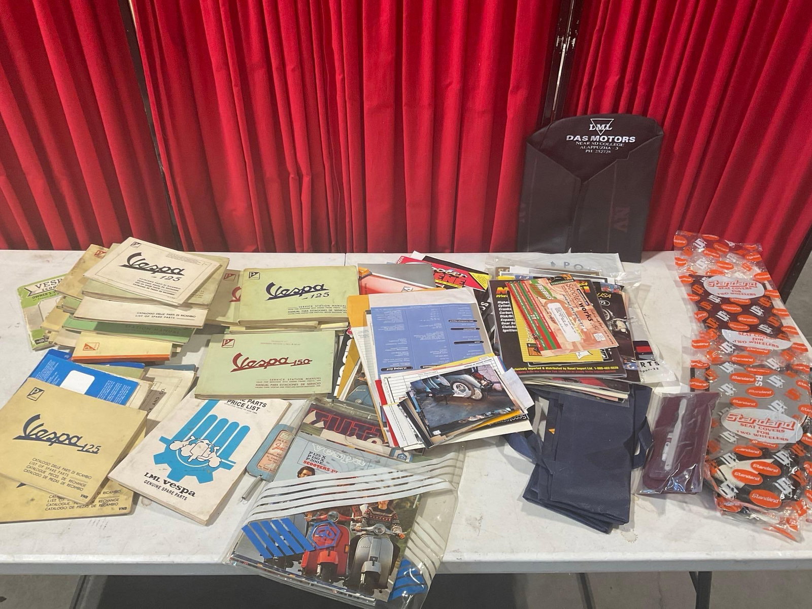Large Assortment of Vespa Manuals, Paperwork, Magazines, & Seat Covers, Vespa 125 & 150: Appears to be in fair to good shape. Some of the manuals show some wear, unresearched paperwork and ephemera. All fits in a box that measures approx 9.5h x 18.5w x 13.5d inches. See pics. E-2684