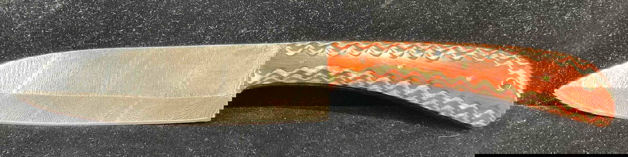 Handmade Damascus Steel 6" Filet Knife w/ Two-Tone Wood Handle. See pics.: Made from several layers of 1095 &amp; 15N20 steel folded multiple times creating between 288-512 layers to form unique patterns in the blades. Each handle is custom fit. Excellent Condition. Blade le