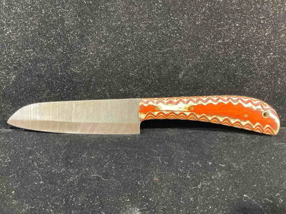 Handmade Damascus Steel 5" Filet Knife w/ Two-Tone Wood Handle. See pics.: Made from several layers of 1095 &amp; 15N20 steel folded multiple times creating between 288-512 layers to form unique patterns in the blades. Each handle is custom fit. Excellent Condition. Blade le