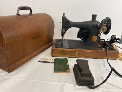 Antique Singer Sewing Machine model 128, Bentwood Carrying Case: SN: AH614418. Appears to be in fair to good shape, tested, needs some TLC but seems to move a bit. The piece measures approx 14h x 19w x 9d inches. See pics. E-4140