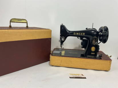 Early 20th Singer 99K Sewing Machine w/ Electric Motor, Portable, w/ Case, tested & working: Appears to be in fair to good shape. The piece seems to be tested &amp; working, though needs some servicing. The bulb seems to be burnt out, needs replacing. The case has a broken spot where the latc