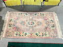 Soft Pink Wool Pile Floor Rug w/ Floral Design. Very Good Condition. 70" x 37" See pics.