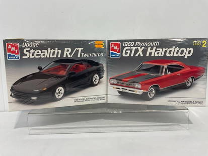 Pair of Sealed Car Model Kits, 1/25 Scale, AMT Dodge Stealth R/T & 1969 Plymouth GTX Hardtop: Appears to be in good shape, seems to be still factory sealed from 1992 &amp; 1993. The boxes together measures approx 8.5h x 7.5w x 10d inches. See pics. E-4050