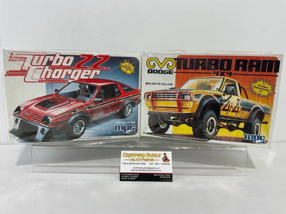 Pair of Sealed Car Model Kits, 1/25 Scale, MPC Dodge Turbo Charger 22 & Dodge 4x4 Turbo Ram: Appears to be in good shape. The boxes together measures approx 7.5h x 7w x 10d inches. See pics. E-4050