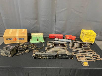 Lionel Trains, 14 pieces of track, Transformer, Engine & Tender, Caboose, Box Car, Flat Car & more: Appears to be in fair to good shape. The pieces fit in a box that measures approx 9h x 13w x 13d inches. See pics. E-4190