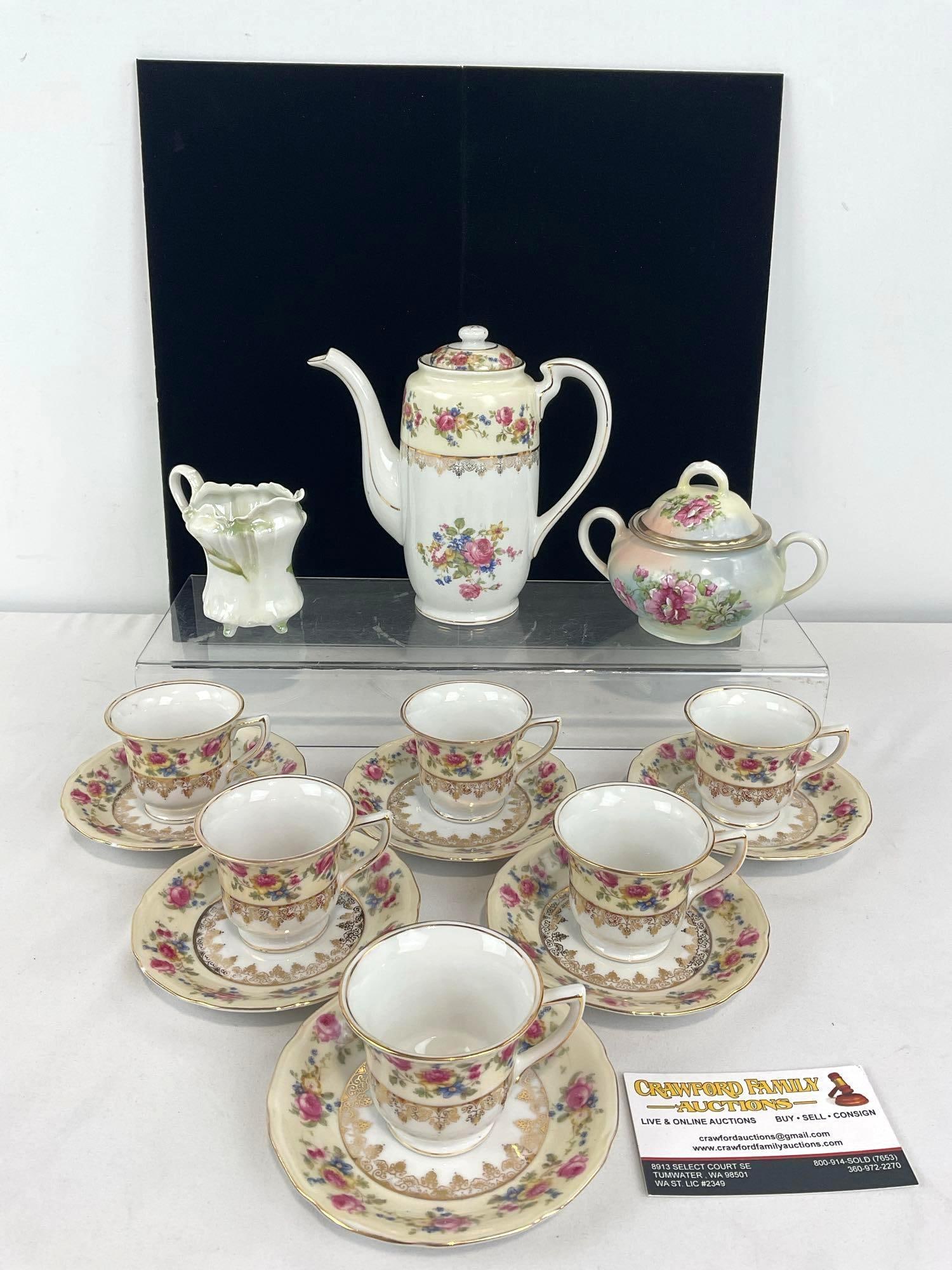 Goldcastle Cups & Saucers, RS Germany Creamer, & Austrian Eagle China Sugar Pot, 15 pieces in total: Includes: Teapot, 6 cups & 6 saucers by Goldcastle, 1 RS Germany, Creamer, Eagle China Austrian sugar. Appears to be in good shape. The pieces fit in a box that measures approx 7h x 9w x 12d inche