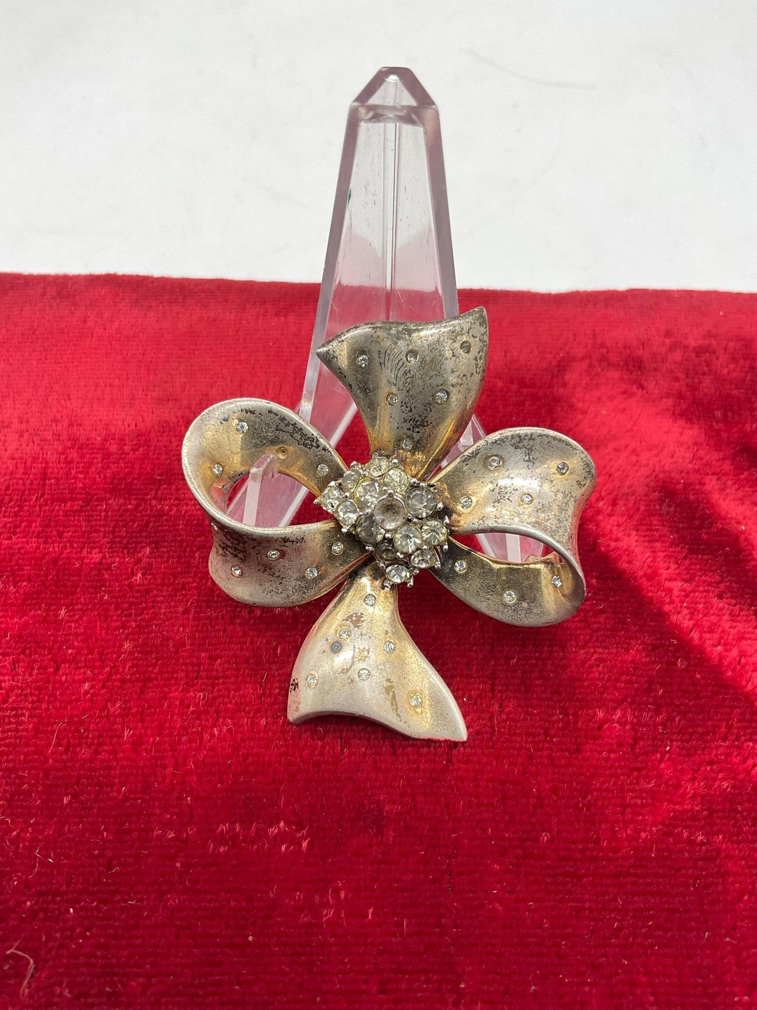 Rare Vintage Sterling Silver Circa 1930's Crown Trifari Bowtie Brooch w/ rhinestones 31.77 Grams: C-4090 center ckuster is missing a rhinestone