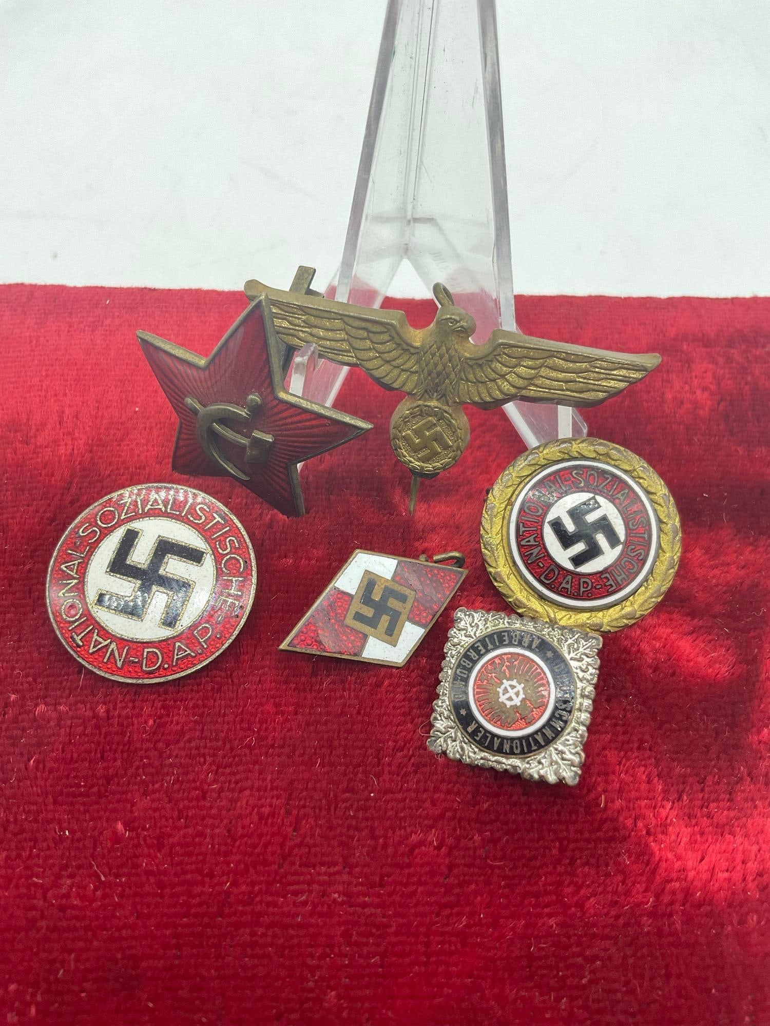 Collection of WWII Germany NSDAP pins along with Soviet enamel pin (1 of 4)