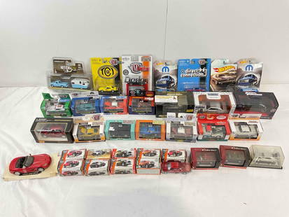 35 Die Cast Model Cars, all but 1 NIP. Matchbox, M2 Machines, Hot Wheels & More! See pics.: 35 Die Cast Model Cars, all but 1 NIP. Matchbox, M2 Machines, Hot Wheels &amp; More! Minor shelf wear, condition is otherwise very good. Fits in box measuring 12" x 16" x 10" DM-4050