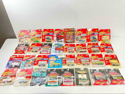 32 pcs NIP 1:64 Scale Die Cast Model Cars from Johnny Lightning, Racing Champions & More!: 32 pcs NIP 1:64 Scale Die Cast Model Cars from Johnny Lightning, Racing Champions &amp; More! Minor shelf wear, condition is otherwise very good. Fits in box measuring 12" x 16" x 10" DM-4050