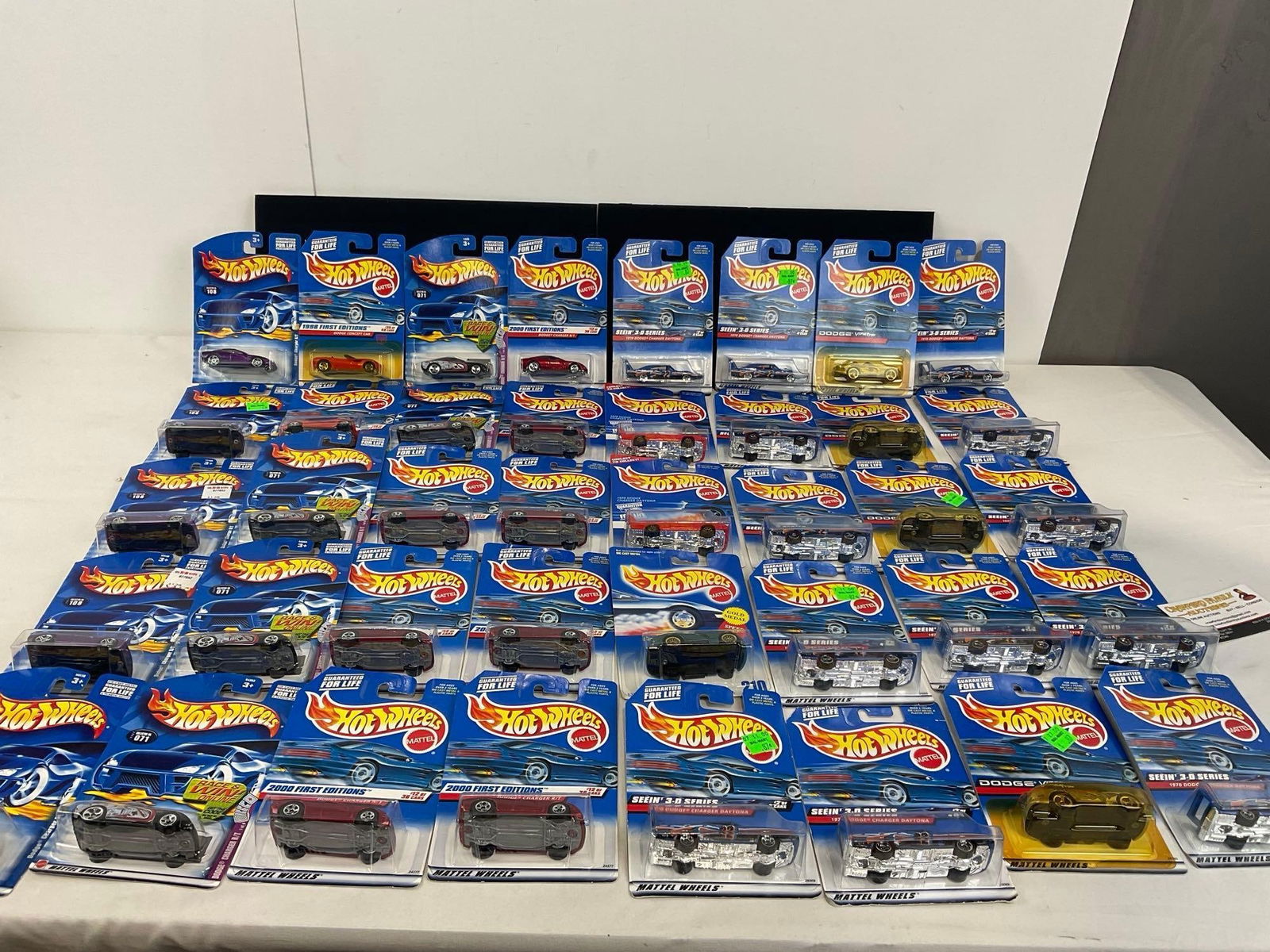 40 Hot Wheels Diecast Cars, NIP 1:64 Scale, MOPAR, 2000 First Editions, Seein 3-D Series & more: Appears to be in good shape, some have some shelf wear, and some have yellowed plastic. The pieces fit in a box that measures approx 8h x 19w x 13d inches. See pics. E-4050