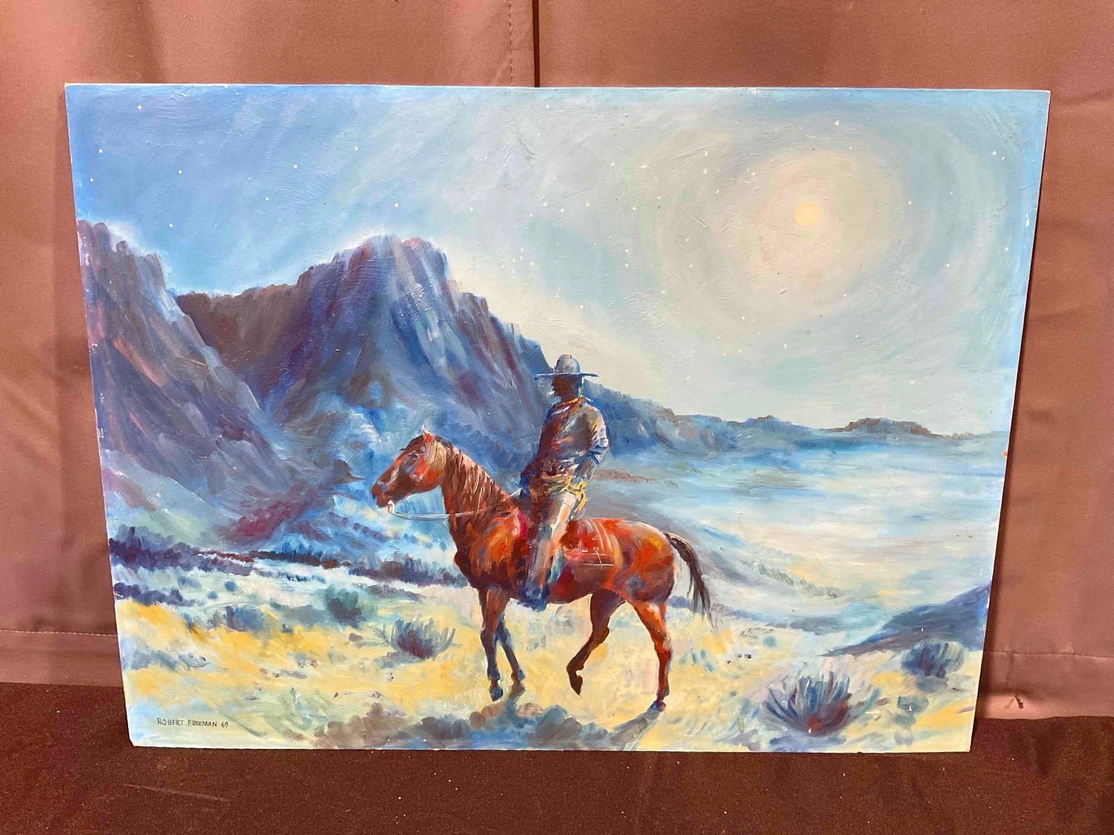Unframed Original Oil Painting of Cowboy Signed Robert Freeman '69. Excellent Condition.: Unframed Original Oil Painting of Cowboy Signed Robert Freeman '69. Excellent Condition. Looks to be done on particle board? Very cool piece deserving of a cool frame. Measures 24" x 18" DM-4480