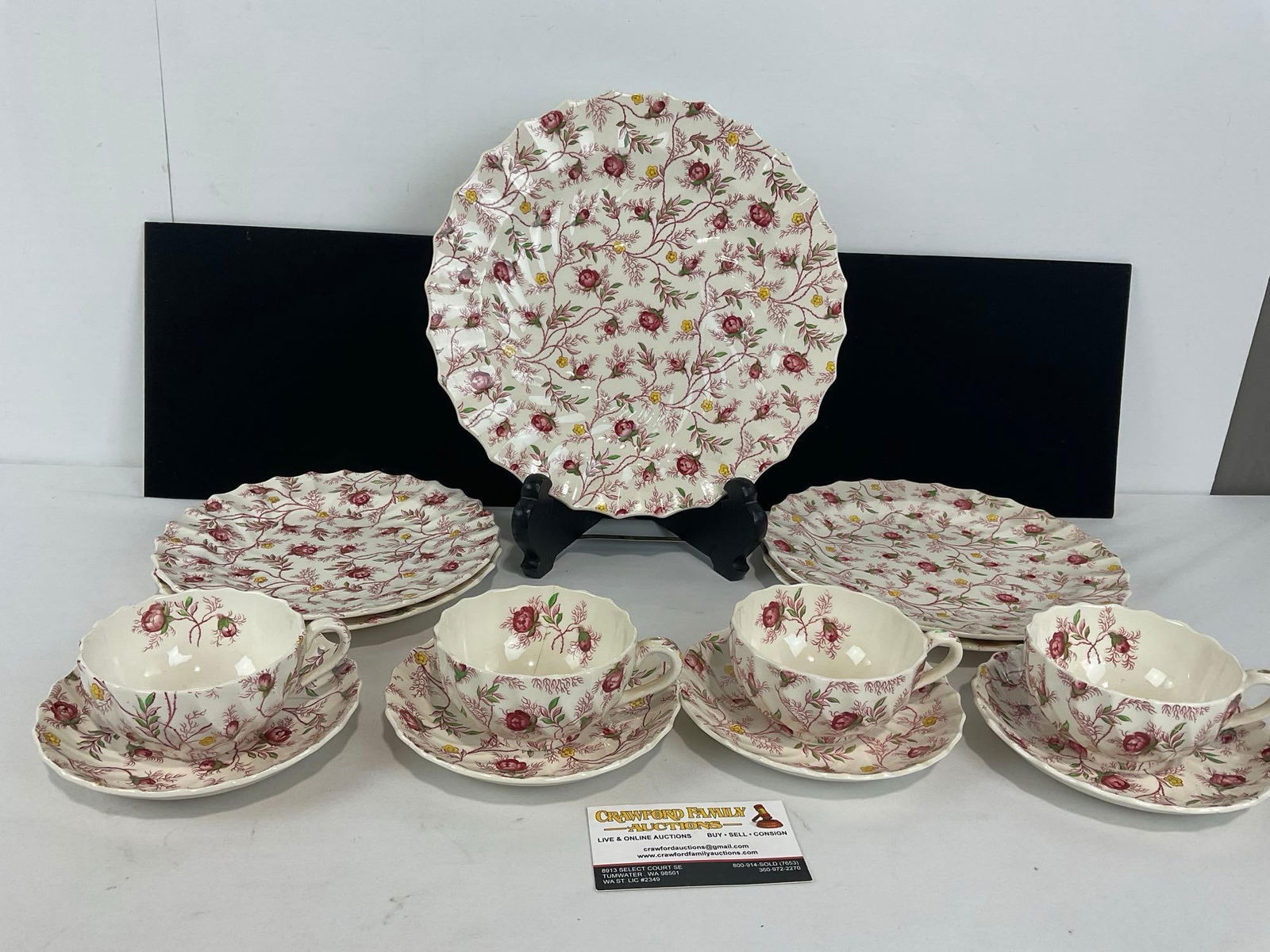 Copeland Spode Great Britain Rosebud Chintz pattern, red transferware, 13 pieces: Includes: 1 dinner plate, 2 lunch plates, 2 bread & butter plates, 4 cups & saucers. Appears to be in good shape. The piece measures approx 9h x 11w x 11d inches. See pics. E-4710