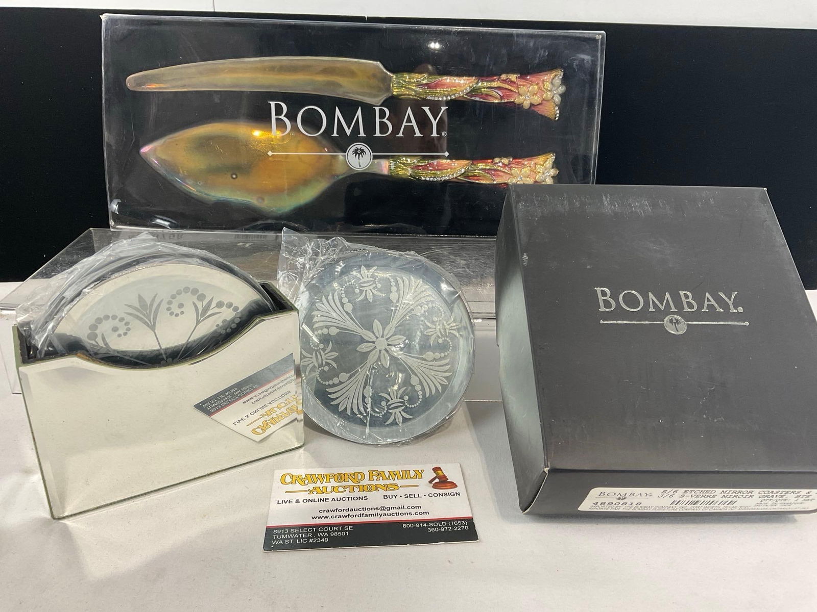 Bombay Mirrored & Etched Coasters w/ Holder & Cake Knife & Server, Like New w/ packaging: Appears to be in good shape. The pieces measures approx 5h x 13w x 6d inches. See pics. E-4720