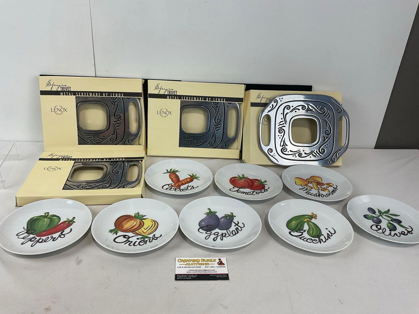 4 Lenox Spyro Trivets & 8 Lenox Ingredient Plates, Onions, Peppers, & more: Appears to be in good shape. The pieces measures approx 9h x 11w x 9d inches. See pics. E-4720