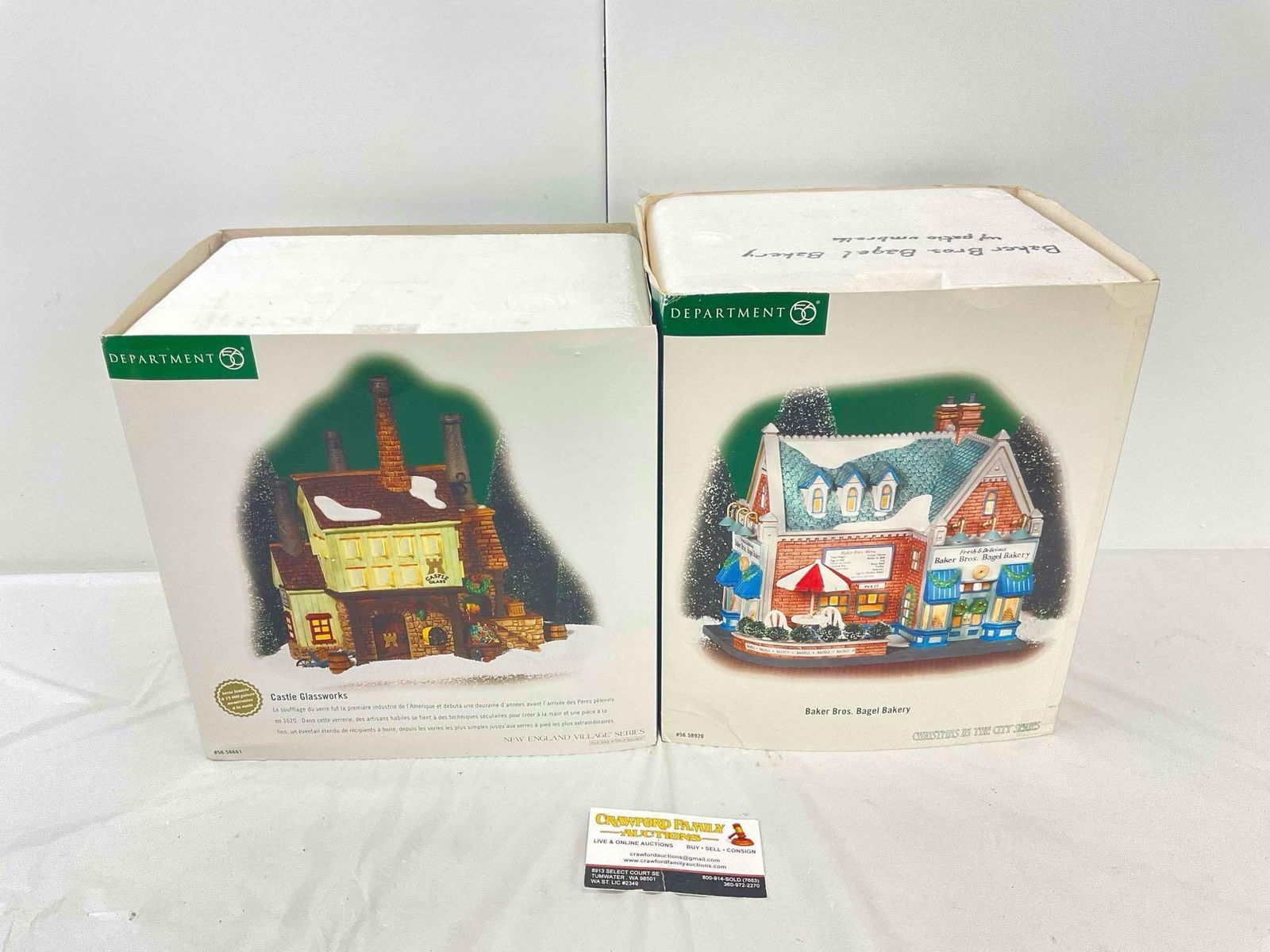2 pcs LNIB Department 56 Christmas Village Ceramic Houses. Excellent Condition. See pics.: 2 pcs LNIB Department 56 Christmas Village Ceramic Houses. Excellent Condition. Castle Glassworks & Baker Bros. Bagel Bakery. Opened for photos, still in original packaging, condition is otherwise