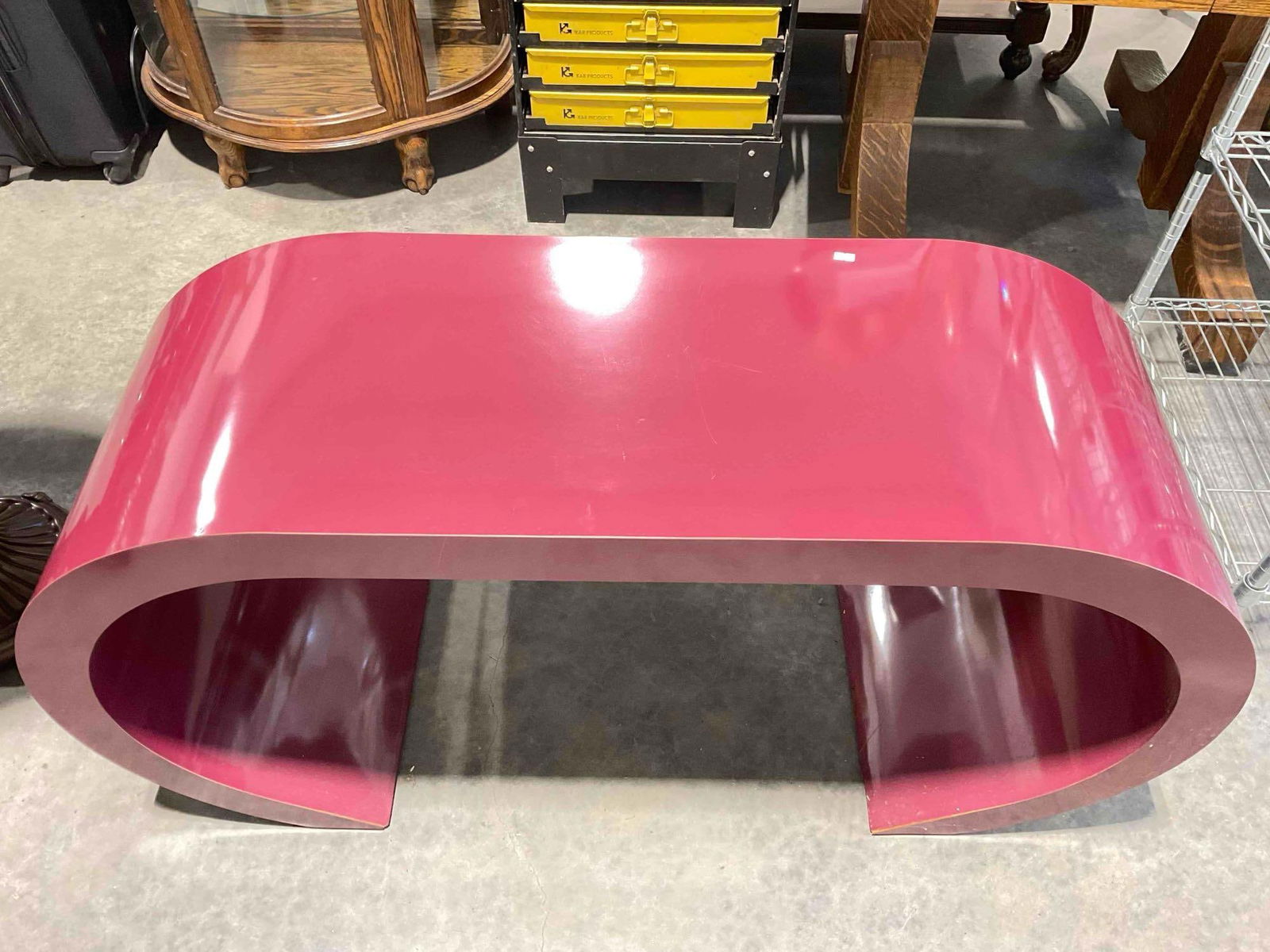 Mid Century Modern Springer Style Plum Waterfall Console Table. Very Good Condition. See pics.: Mid Century Modern Springer Style Plum Waterfall Console Table. Very Good Condition. Looks to be laminate over plywood. Minor wear, plywood is exposed in places, condition is otherwise very good. Meas