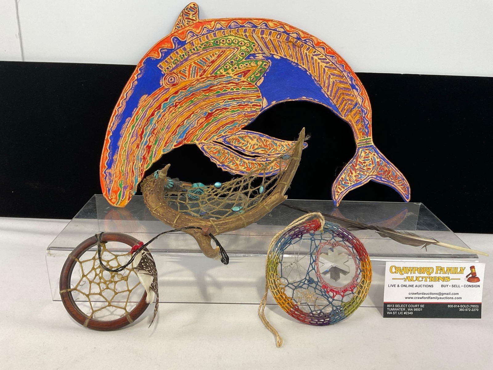 Dolphin Shaped Art piece 1998, signed on back, 3x Dreamcatchers, 1 w/ Antler: Looks like the dolphin shaped piece is signed James Bethke or something similar. 1998. Appears to be in good shape. The piece measures approx 4h x 16w x 13d inches. See pics. E-4670