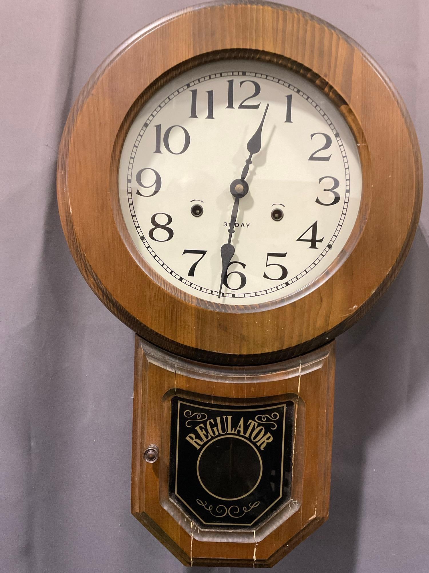 Vintage 31 Day Regulator Time Strike Wall Clock, 23h x 15w x 7d inches, made in Korea: Appears to be in good shape. The piece measures approx 23h x 15w x 7d inches. See pics. E-5130 *Oversized shipping may apply*