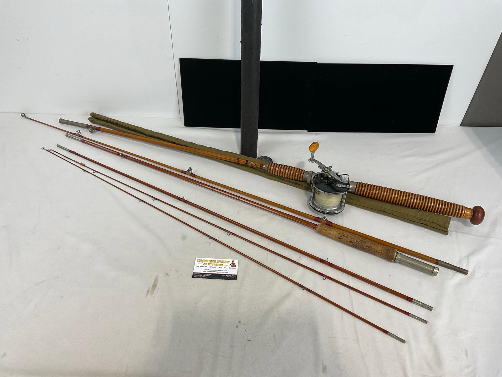 Pair of Fishing Poles, Granger Champion in portable cylinder case & Montague Pole w/ Penn 60 Reel: *No in-house shipping, due to size** Appears to be in good shape. The piece measures approx 50h x 7w x 7d inches. See pics. E-4870 *No in-house shipping, due to size*