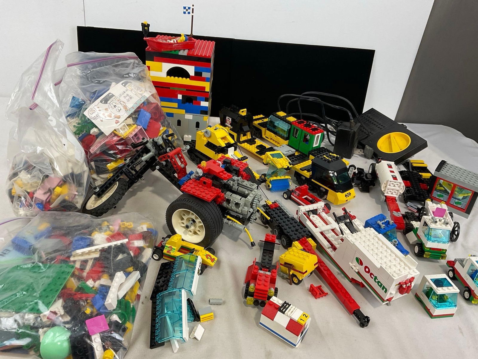 Vintage LEGO pieces, Train Transformer, Train Cars, several set pieces, several bags of blocks (1 of 6)