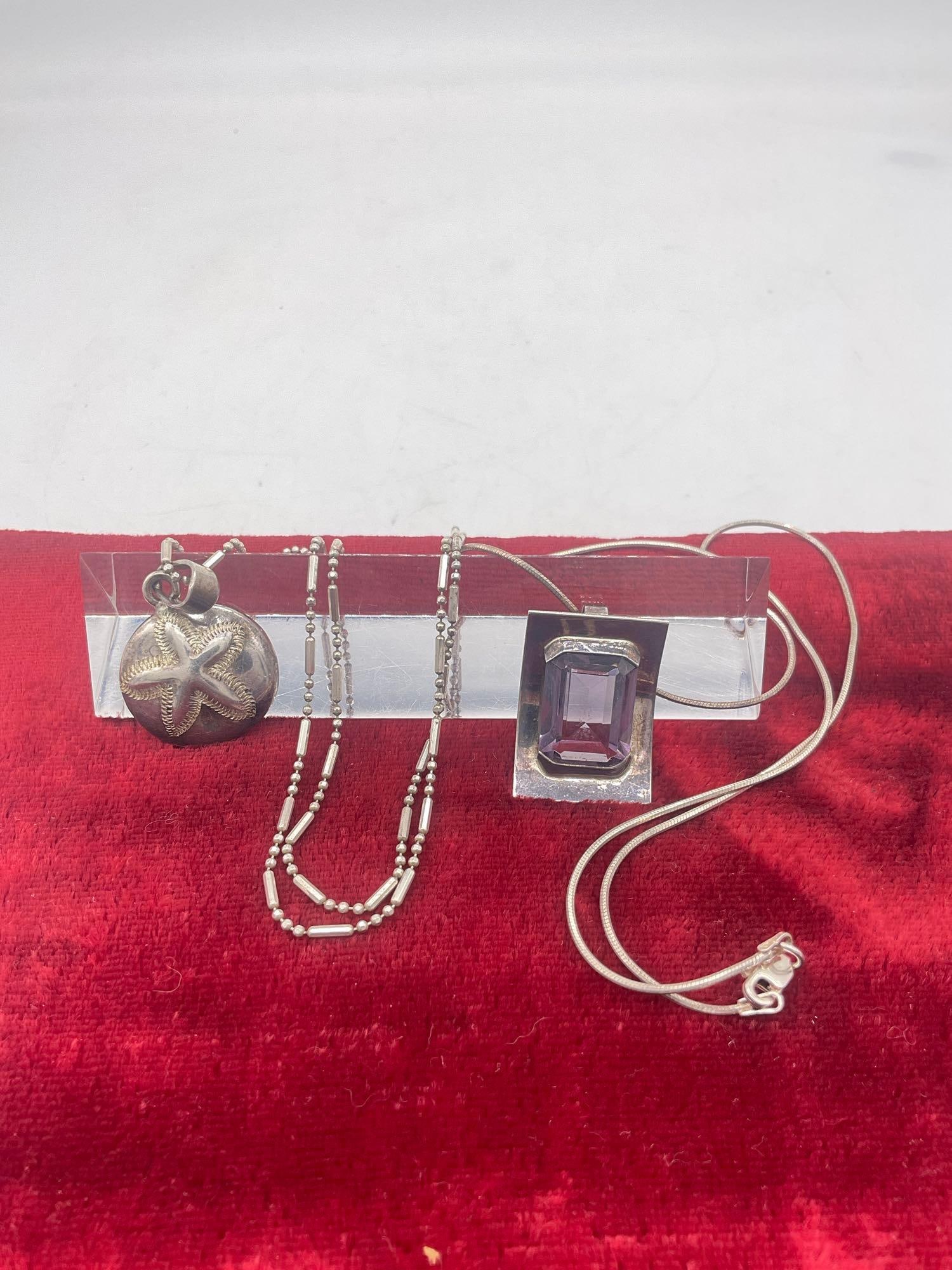 2 Lovely sterling silver necklaces with fine silver pendants - sand dollar & purple stone: Jc-1554