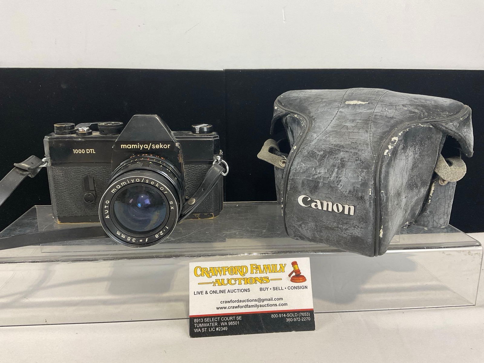 Mamiya/Sekor 1000 DTL Film Camera, SX 1:2.8 F=35mm Auto Lens, w/ Canon Field Case: The field case has some wear. Appears to be in good shape. The piece measures approx 6h x 7w x 6d inches. See pics. E-4920
