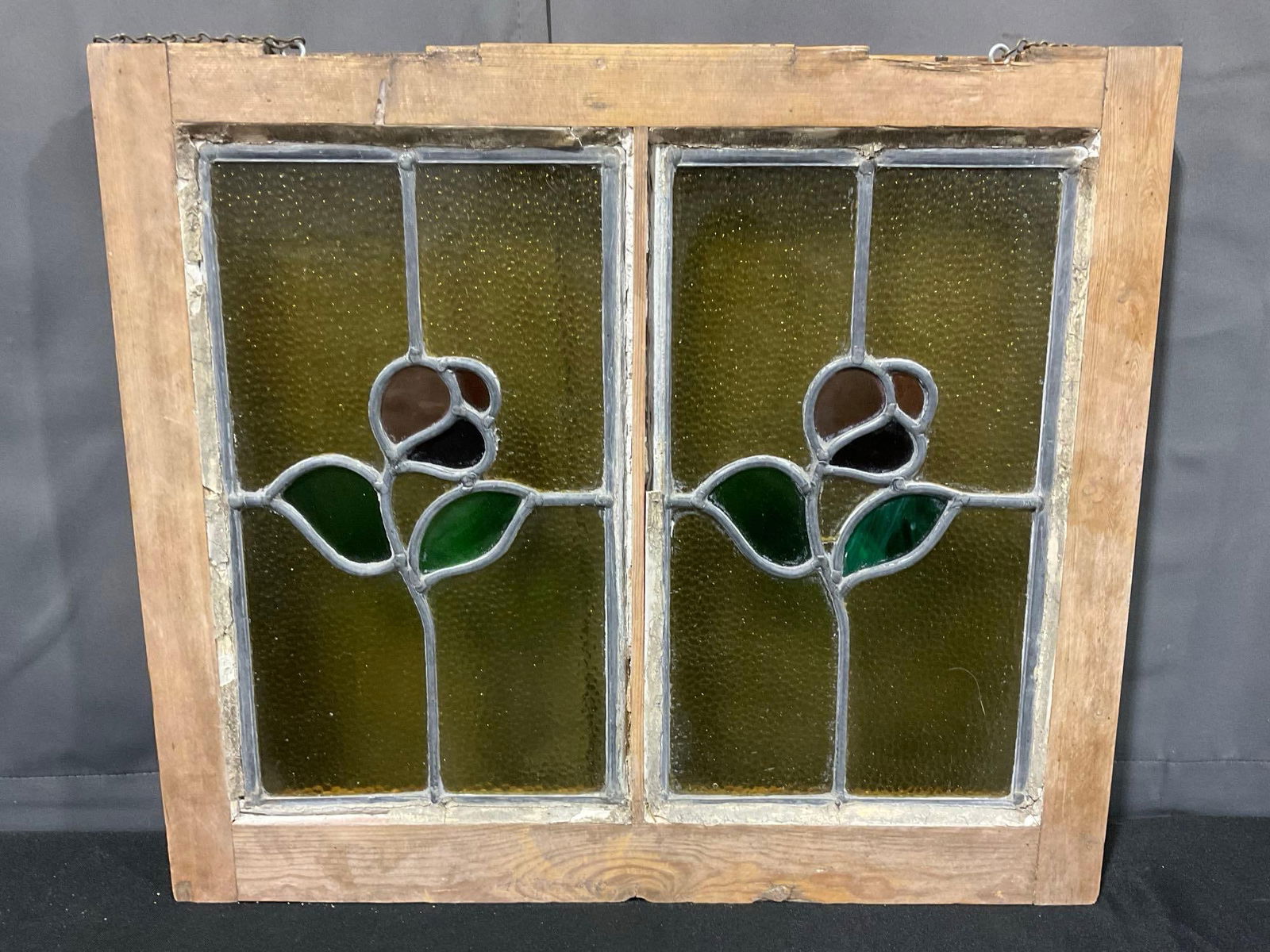 Framed Stained Glass Window, Hanging Piece, Yellow Pebbled Glass w/ Rose Detail, 19h x 21w x 4d i...: Appears to be in good shape, shows its age, missing caulking around the panels. The piece measures approx 19h x 21w x 4d inches. See pics. E-5180 *Oversized shipping may apply*