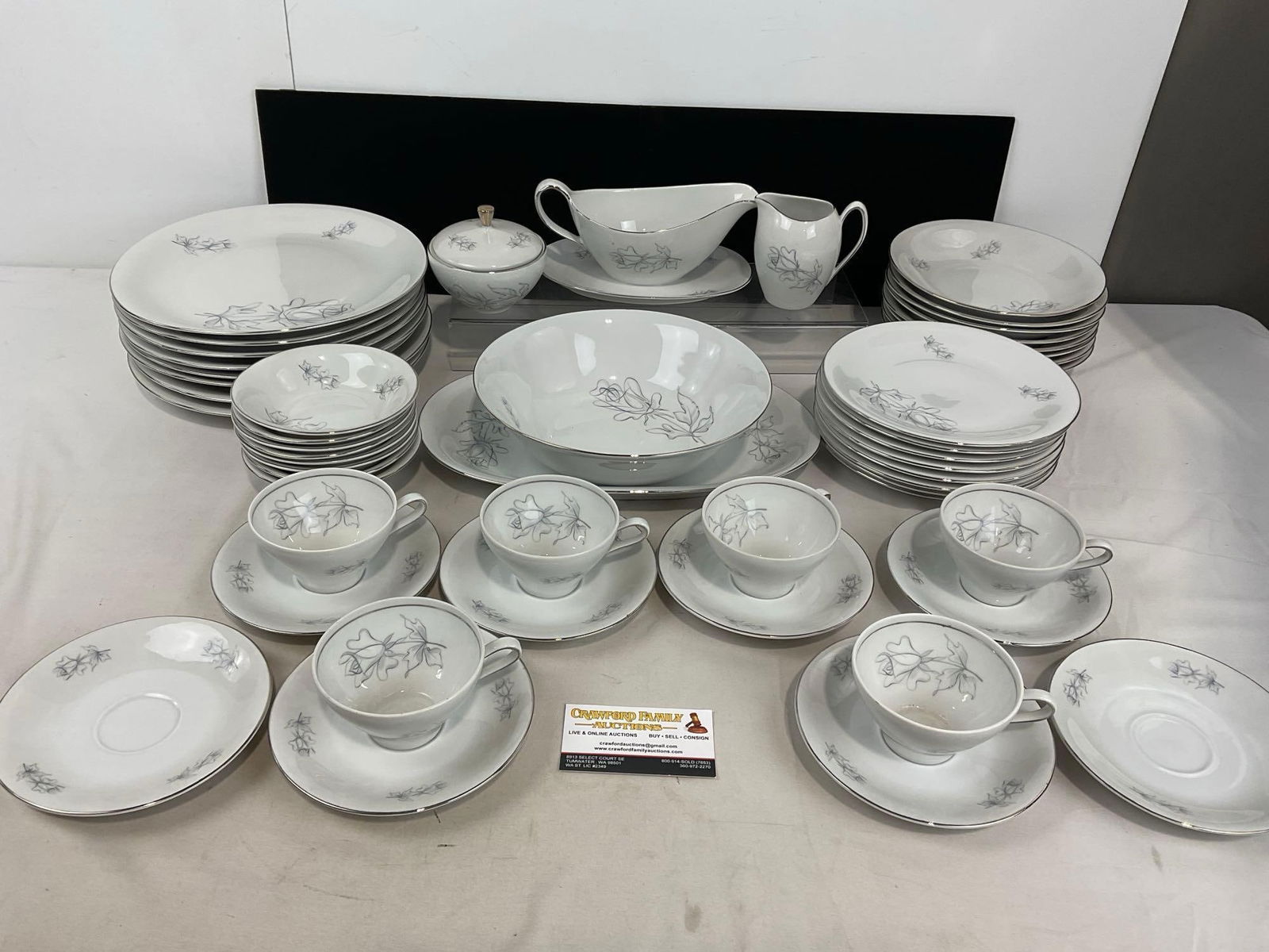 Vintage Winterling Bavarian China, Gray Silver Rose pattern, approx 51 pieces in total: Includes: 6 cups, 8 saucers, 8 dinner plates, 8 lunch plates, 8 small bowls, 8 medium bowls, veg bowl, platter, gravy boat, sugar & creamer. Appears to be in good shape. The set measures app
