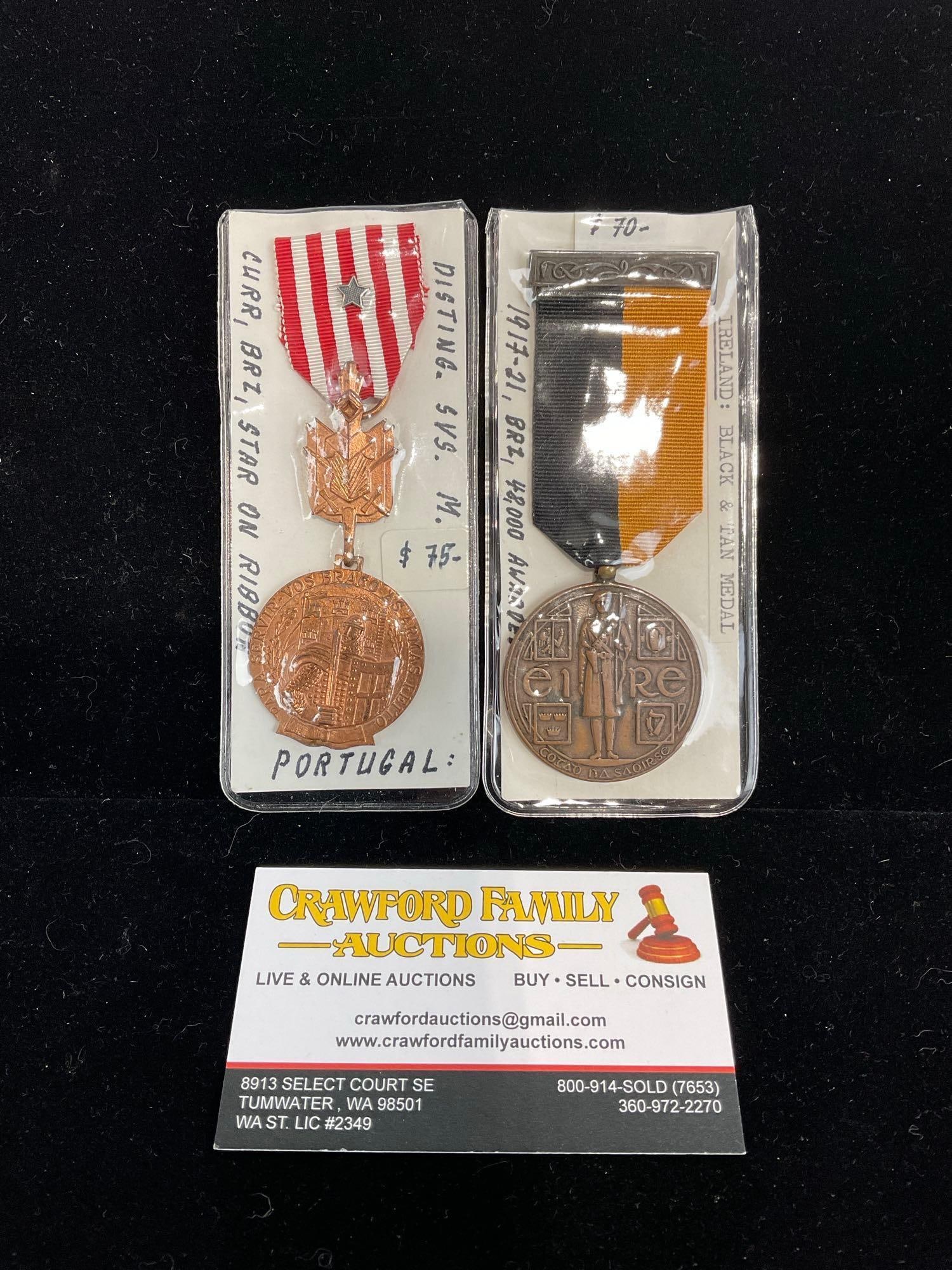Pair of Medals, Disting. Service Portugal, Bronze & Irish Black & Tan Medal, 1917-21 Bronze, Eire: All from a single collection, these are briefly described on the tag and were kept in a display. They measure approx 6h x 3w x 2d inches. See pics. E-5300