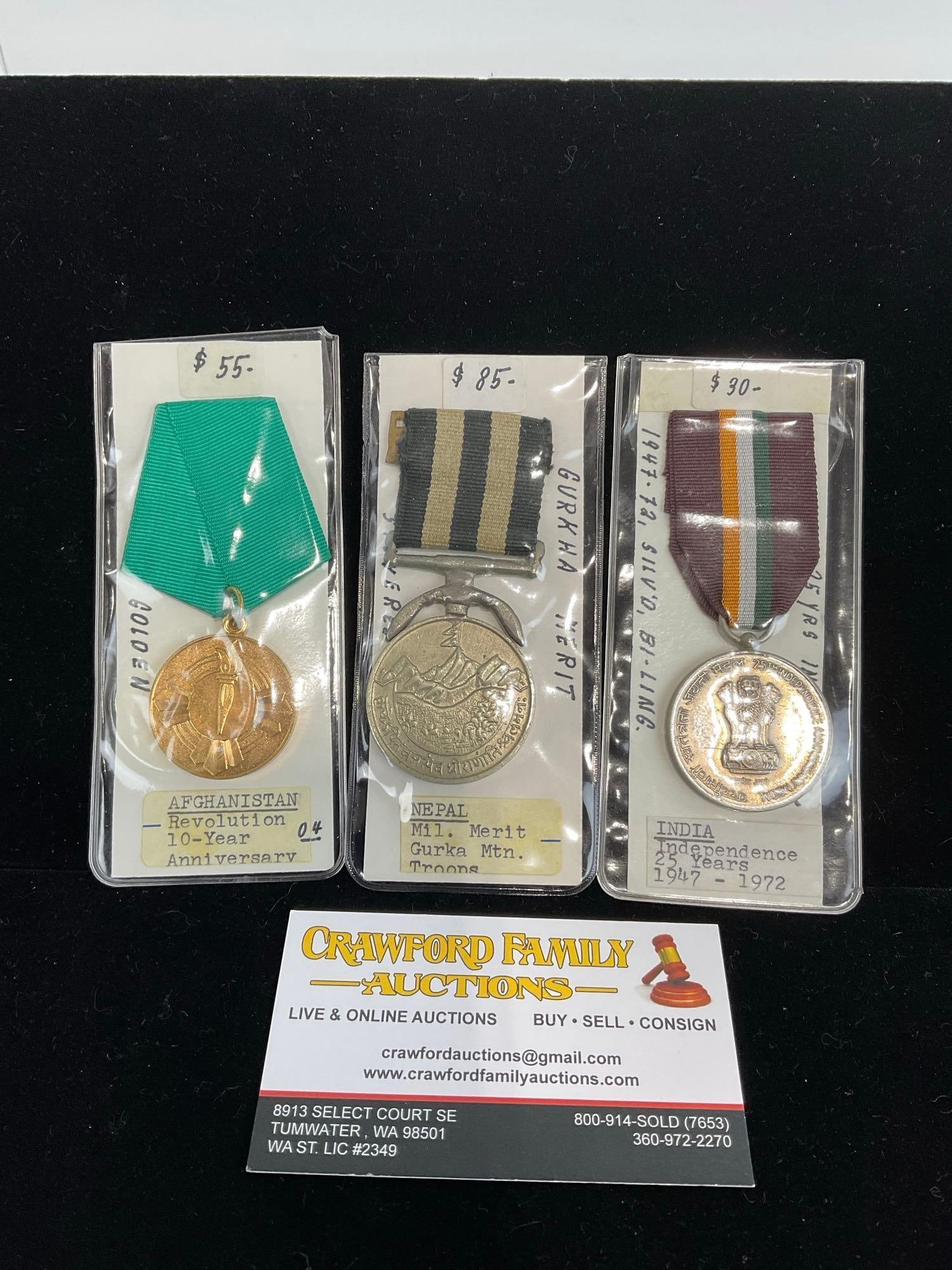 3 Medals, Afghani Revolution 10 yr Anni, Nepal Mil. Gurka Mtn Troops, India Independence Medal 47...: All from a single collection, these are briefly described on the tag and were kept in a display. They measure approx 6h x 3w x 2d inches. See pics. E-5300