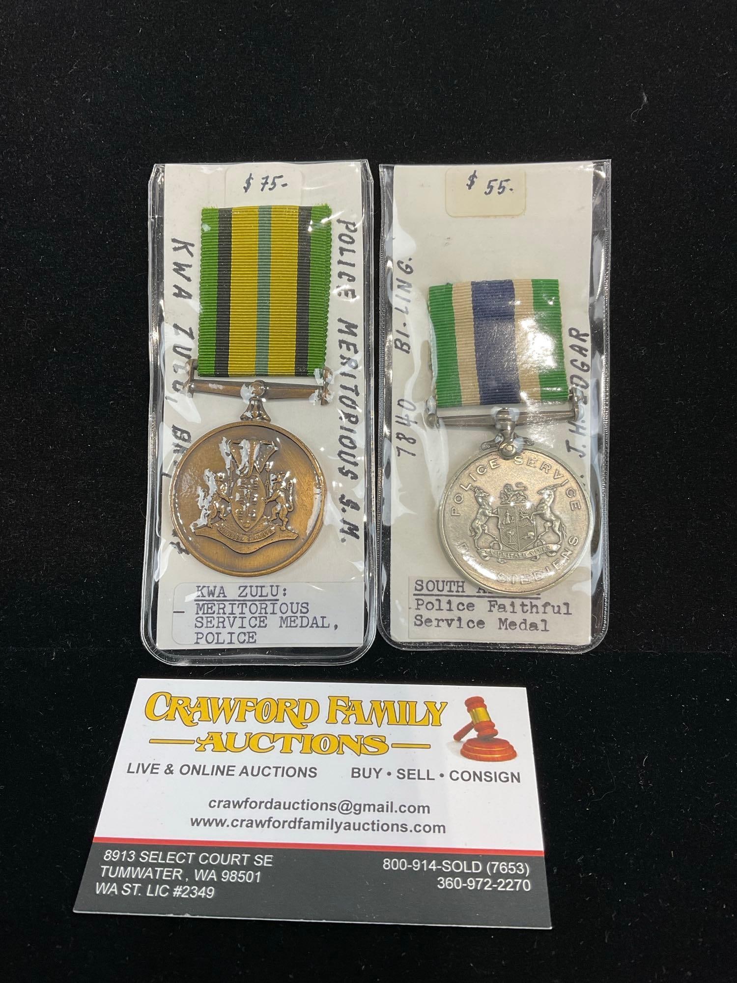 Pair of South African Medals, 1x Kwa Zulu, Meritorious Serv. Police & 1x SA Police Faithful Serv.: All from a single collection, these are briefly described on the tag and were kept in a display. They measure approx 6h x 3w x 2d inches. See pics. E-5300