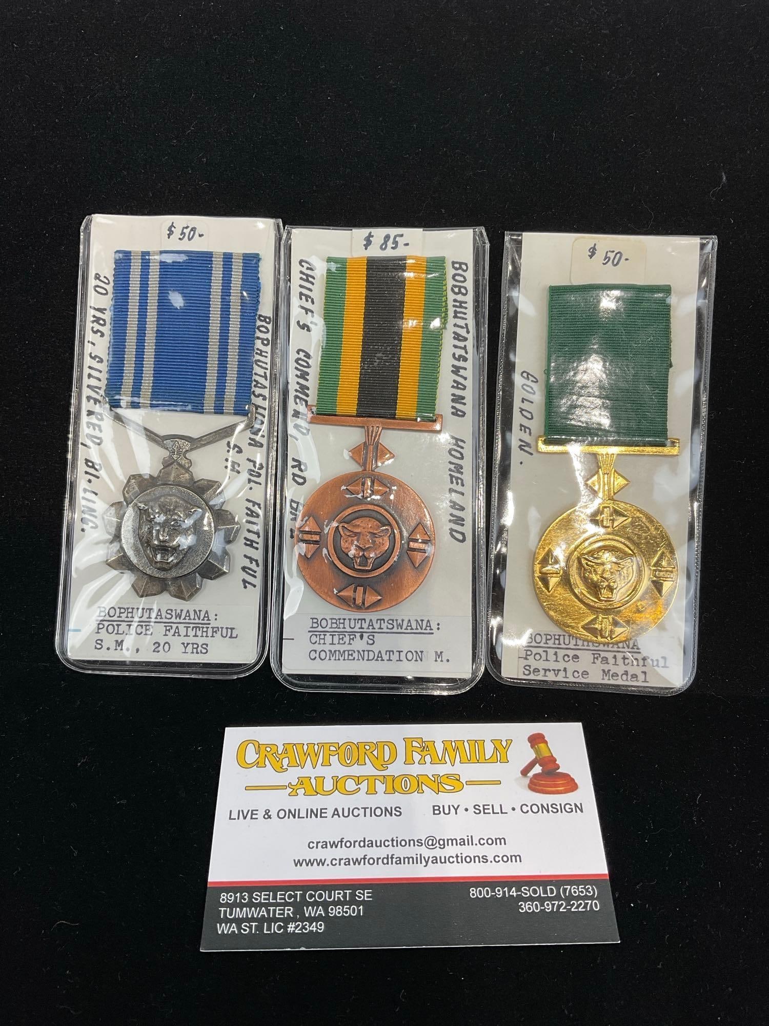 3 Bophutaswana Police Service Medals, 2x Faithful Service, 1 for 20 yrs & Chiefs Commendation: Part of what is now South Africa. All from a single collection, these are briefly described on the tag and were kept in a display. They measure approx 6h x 3w x 2d inches. See pics. E-5300