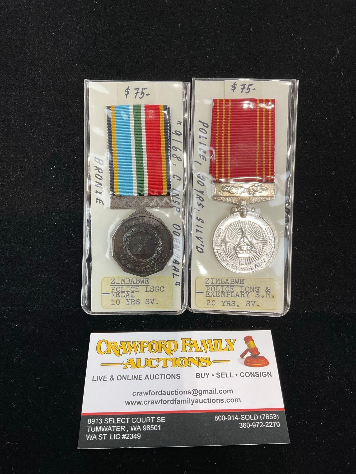 Pair of Zimbabwe Police Long Service Medals, 10 Years Service Bronze & 20 Years Service Silvered (1 of 3)
