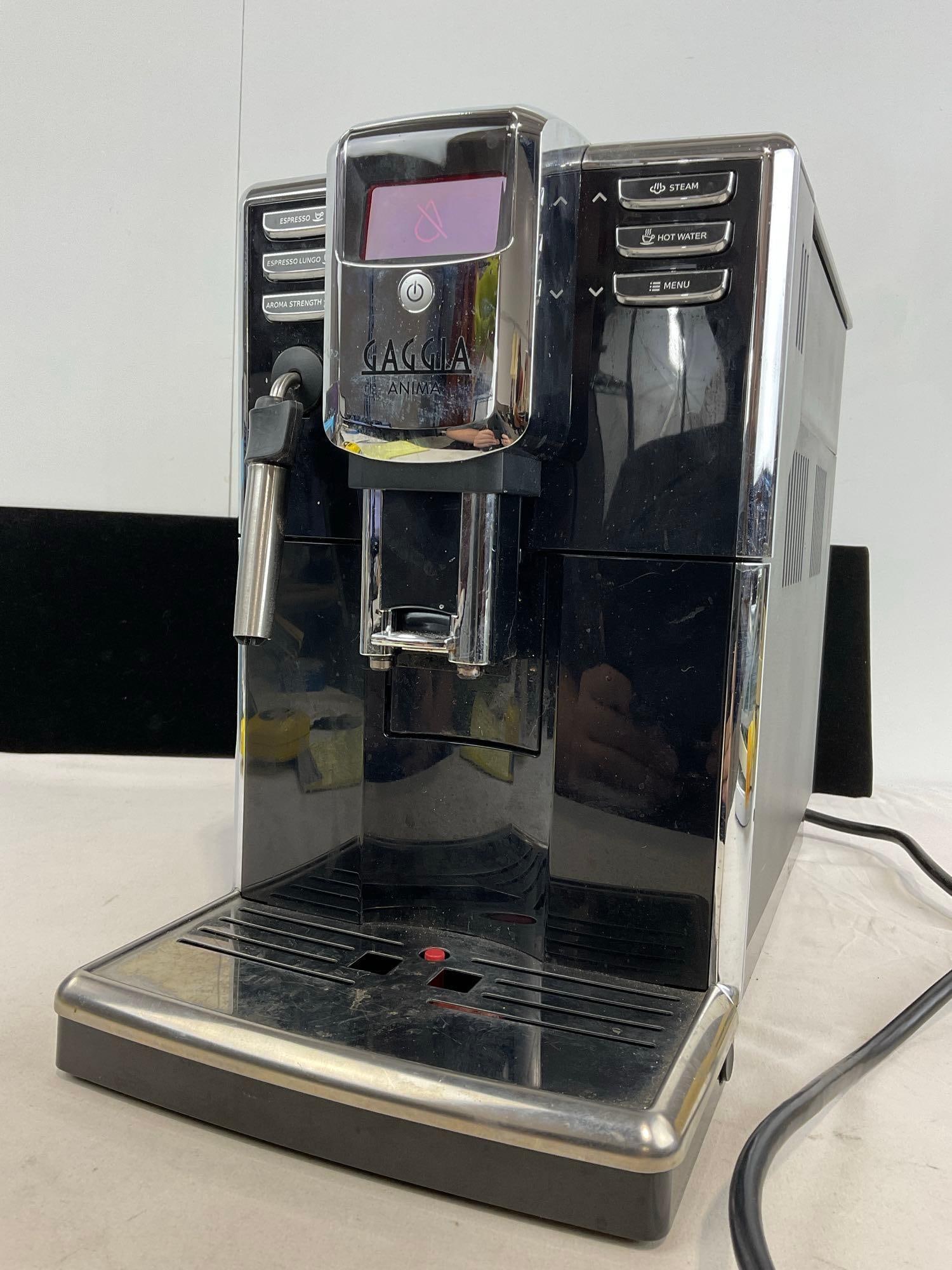 Gaggia Anima Super-Automatic Espresso Coffee Maker, tested, powers on, 14h x 19w x 10d inches: Appears to be in fair to good shape, needs a cleaning run. The piece measures approx 14h x 19w x 10d inches. See pics. E-5180