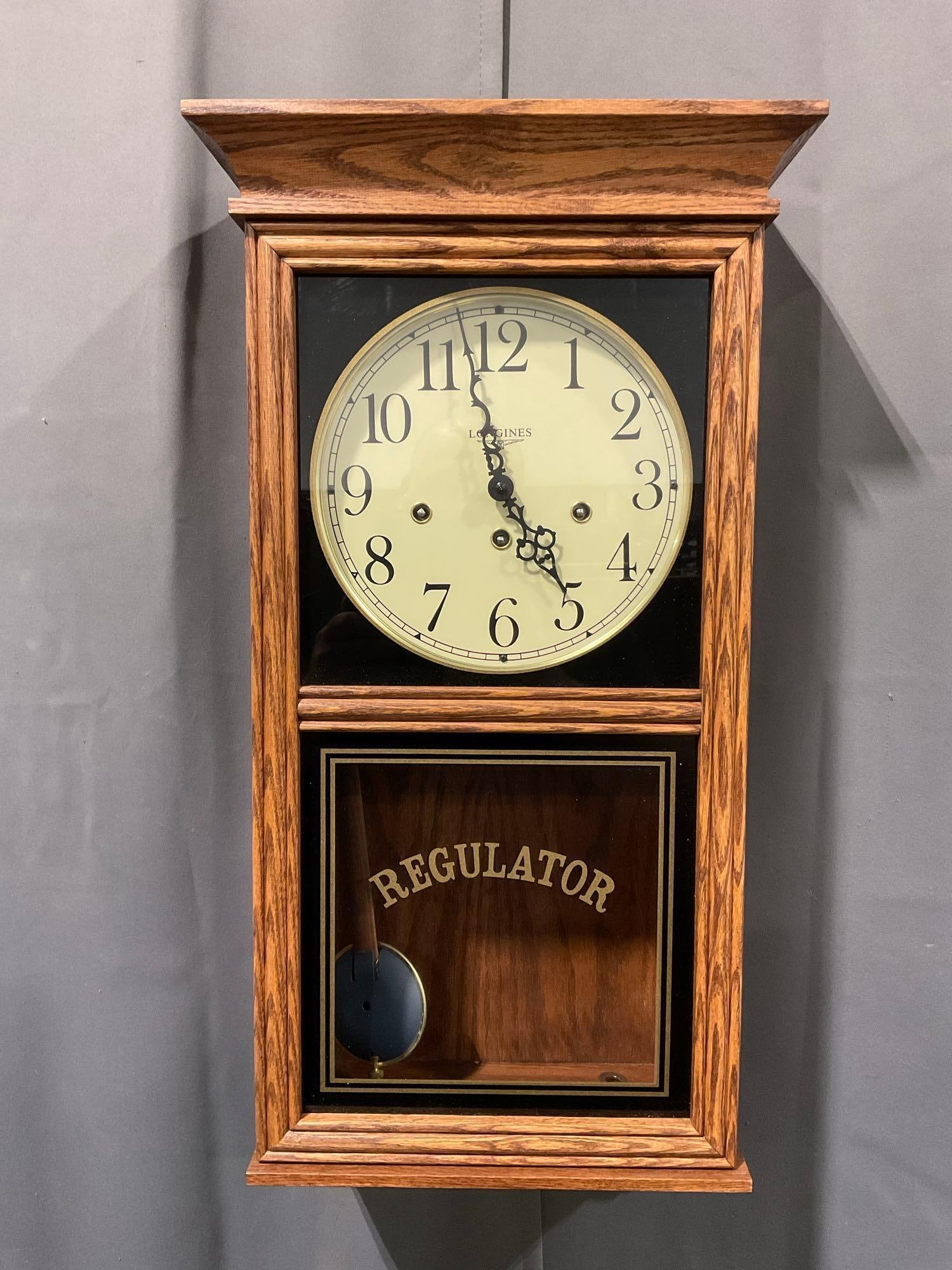 Longines Regulator Wall Clock, Time Strike Chime, w/ Pendulum, 28h x 14w x 8d inches: Appears to be in good shape. The piece measures approx 28h x 14w x 8d inches. See pics. E-5180 *Oversized shipping may apply*