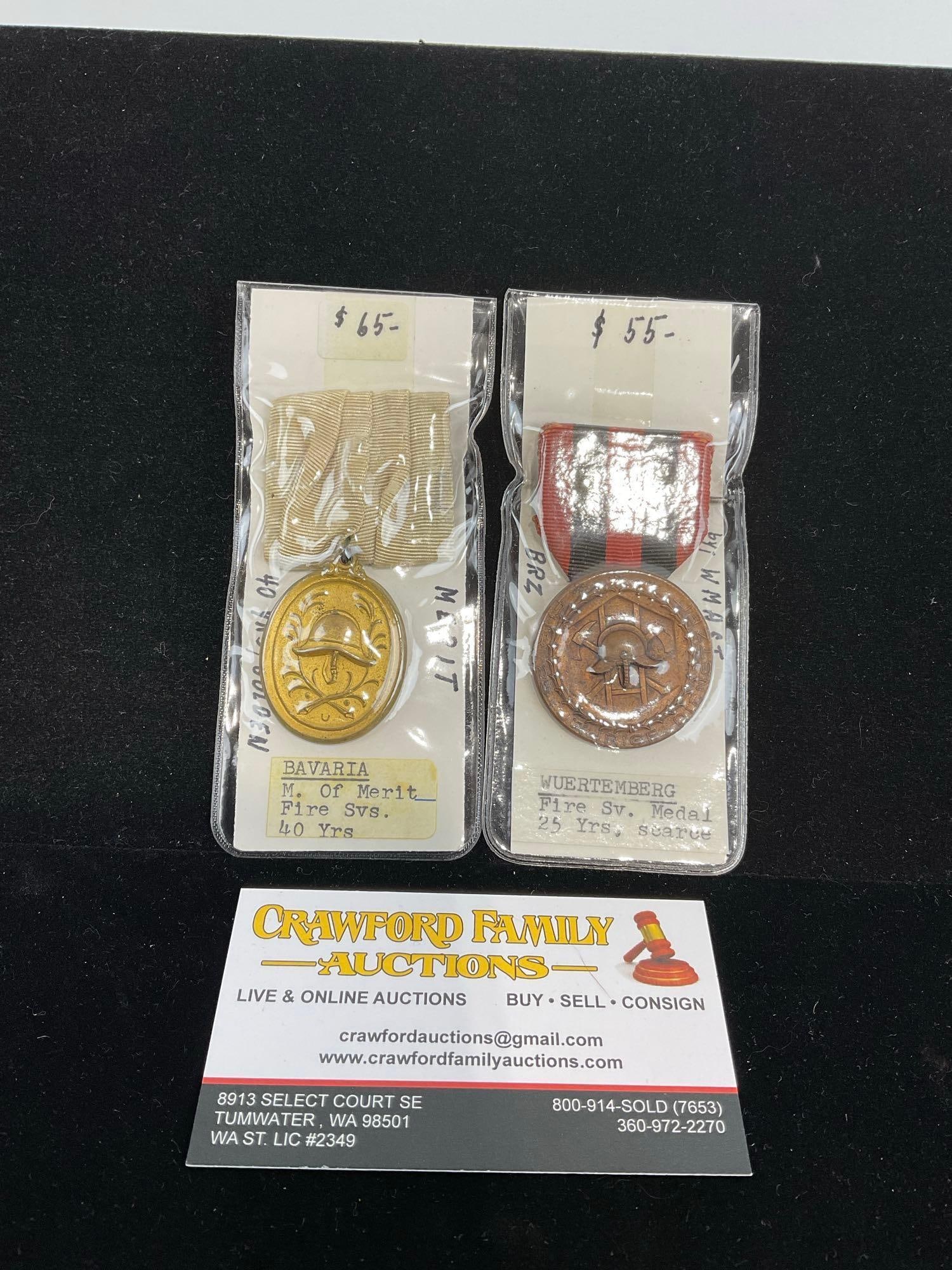Pair of German Fire Service Medals, Bavarian 40 Year Service & Wurttemberg 25 Year Service: All from a single collection, these are briefly described on the tag and were kept in a display. They measure approx 6h x 3w x 2d inches. See pics. E-5300