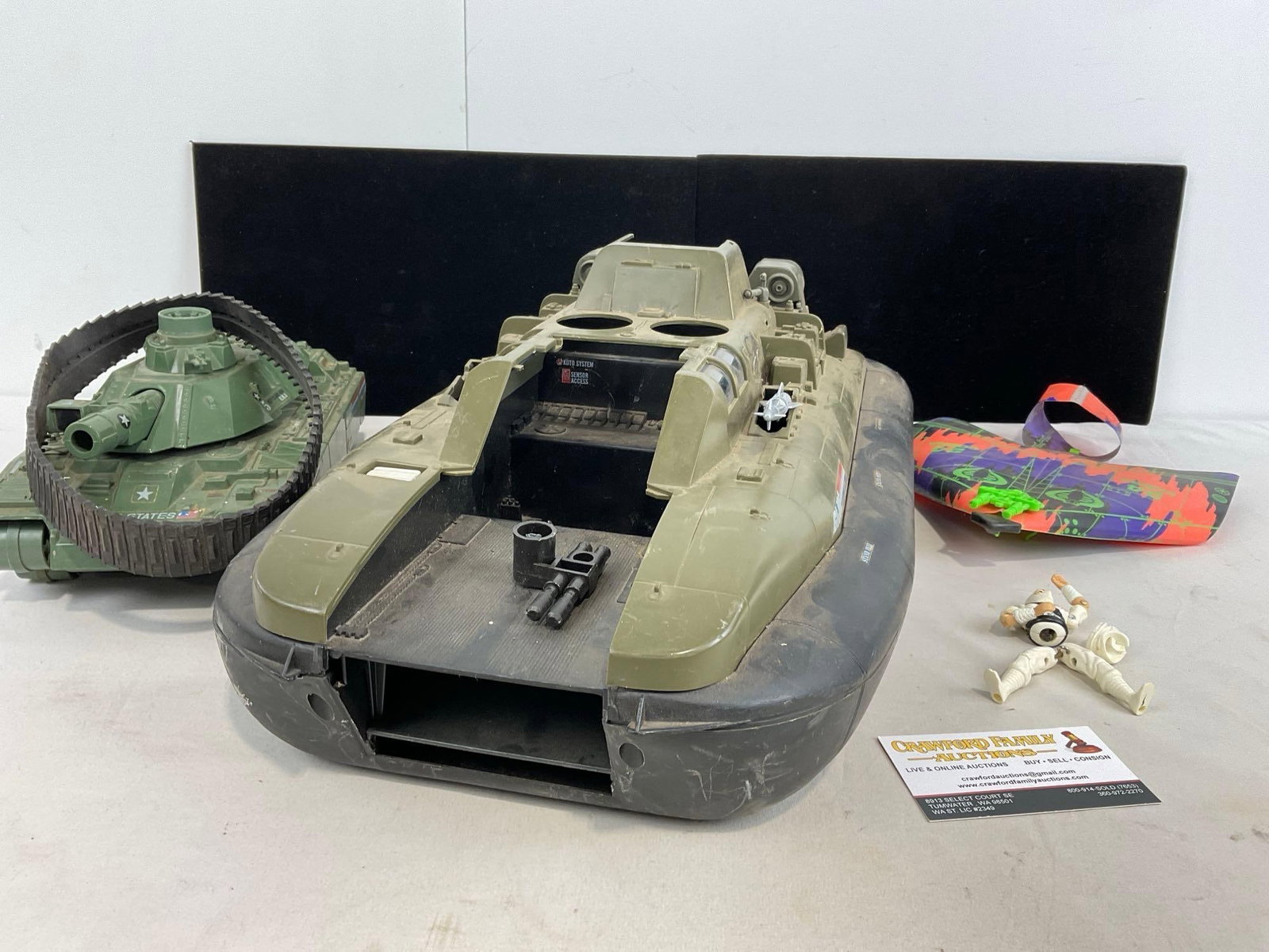 GI Joe Toys, Hovercraft, Tank, Glider, Figure needs some TLC, 10h x 20w x 10d inches: Appears to be in fair shape, some pieces missing. Looks like the wheels are missing off of the hovercraft. Some wear can be seen. The pieces measures 10h x 20w x 10d inches. See pics. E-5180