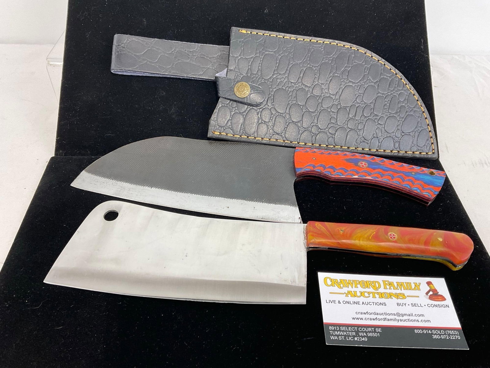 2 Cleaver style Blades, Polished & Rough File Texture Steel, Resin & Dyed Wood Handles, 1 sheath: The Damascus style blades from several layers of 1095 and 15N20 steel folded multiple times creating between 288 and 512 layers to form unique patterns in the blades. Sheath is handmade for the knife.