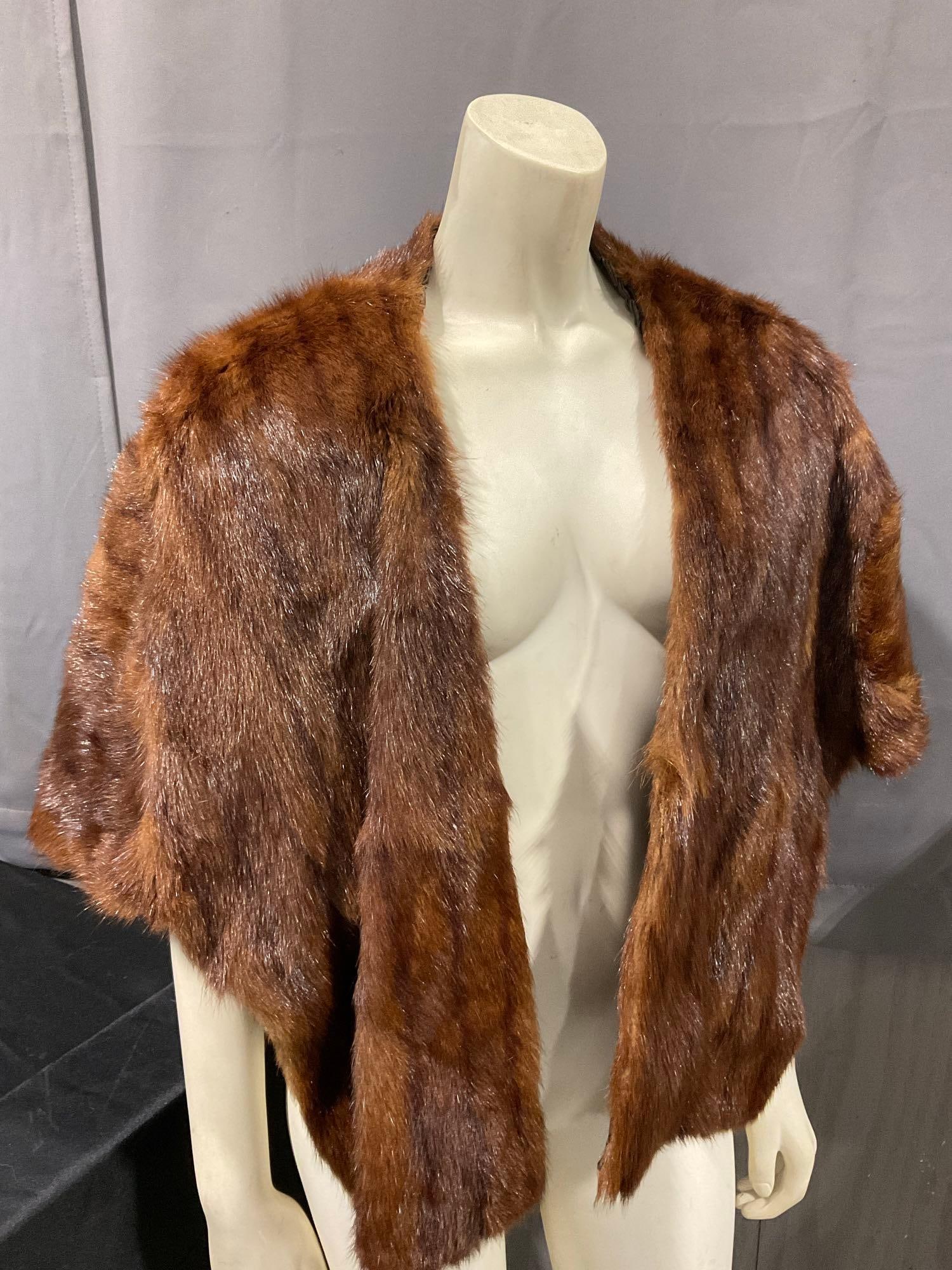 Vintage Mink Fur Stole by Philip Surfas Furs, approx 27h x 20w x 4d inches: Appears to be in fair to good shape. The pieces should be professionally cleaned before wearing. The piece measures approx 27h x 20w x 4d inches. See pics. E-5300