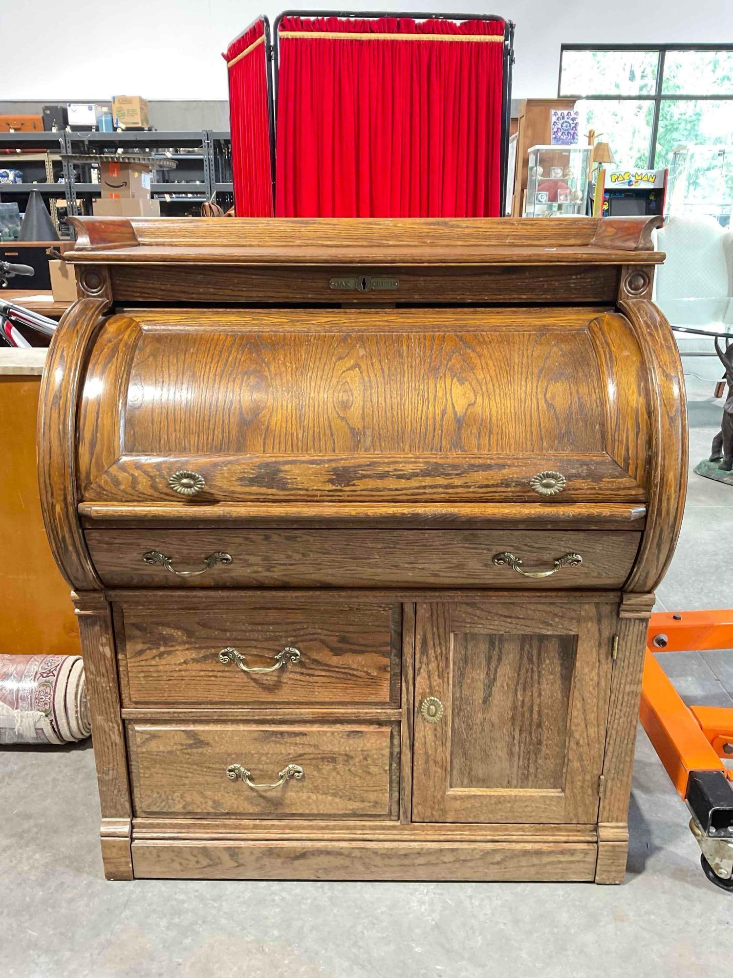 Vintage Oak Crest Oak Wood Roll Top Secretary Desk w/ 5 Drawers & Cupboard. Good Cond.: Vintage Oak Crest Oak Wood Roll Top Secretary Desk w/ 5 Drawers & Cupboard. Good Condition. Water stained, missing a drawer knob, otherwise in good condition. Measures 37" x 24" x 44" DM-4970 