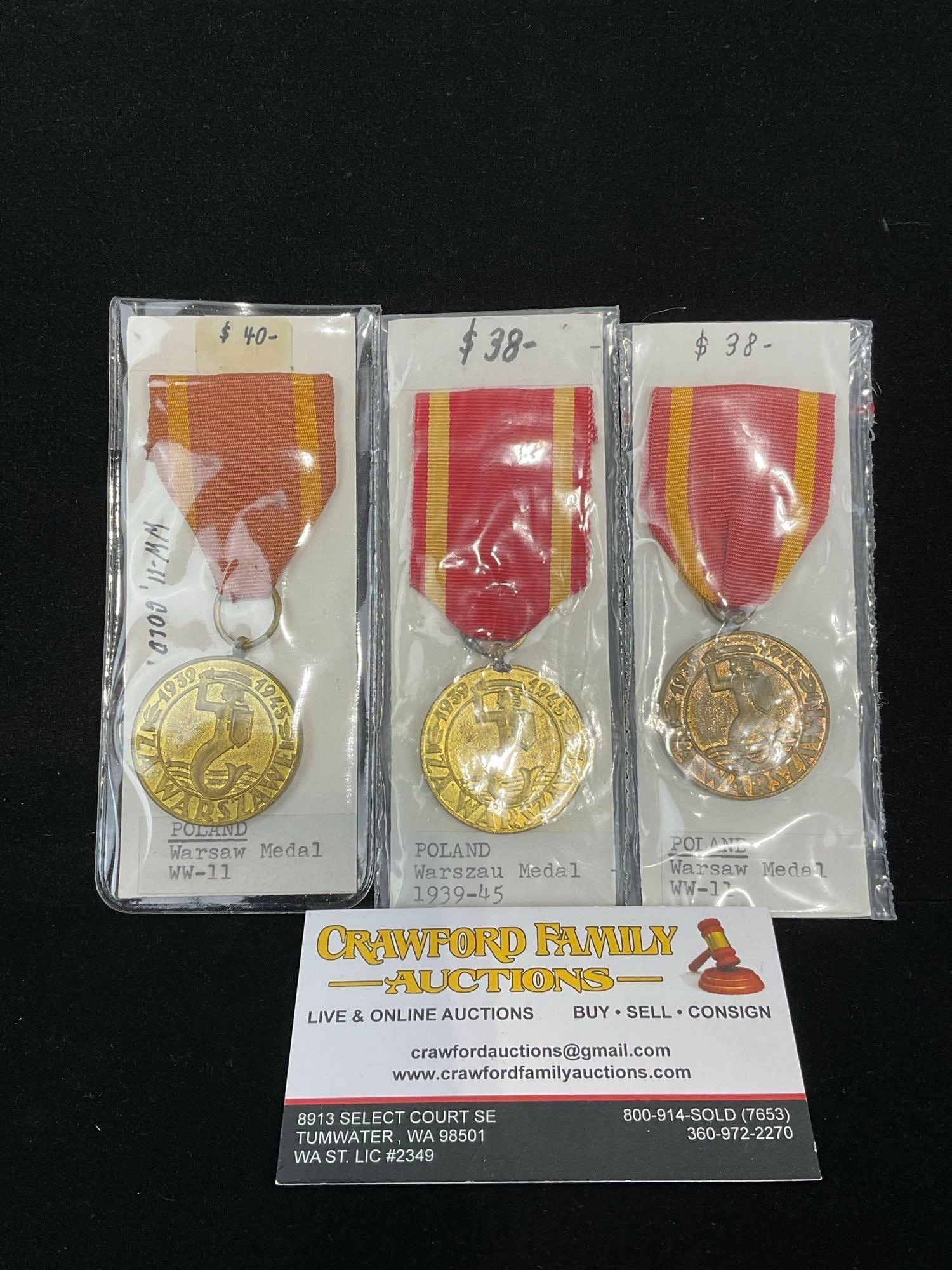 3x Polish Medals, World War 2, Warsaw Medal, 1939-1945, Red/Yellow Ribbon: All from a single collection, these are briefly described on the tag and were kept in a display. They measure approx 6h x 3w x 2d inches. See pics. E-5300 