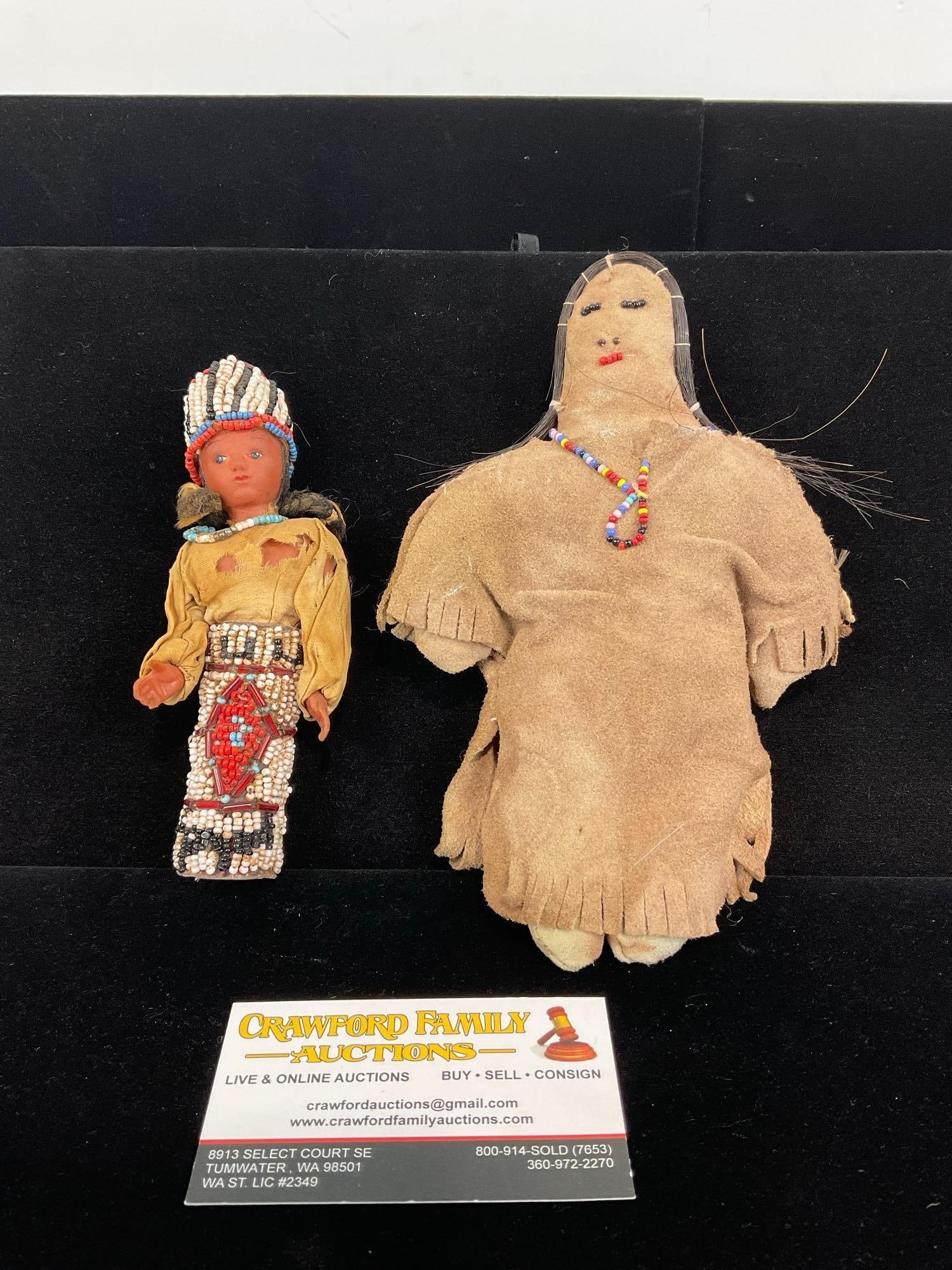 Pair of Antique Handmade Native American Dolls, Buckskin Leather, hand beaded ornamentation,: Appears to be in good shape, some signs of wear. The piece measures approx 8h x 5w x 4d inches. See pics. E-5320 