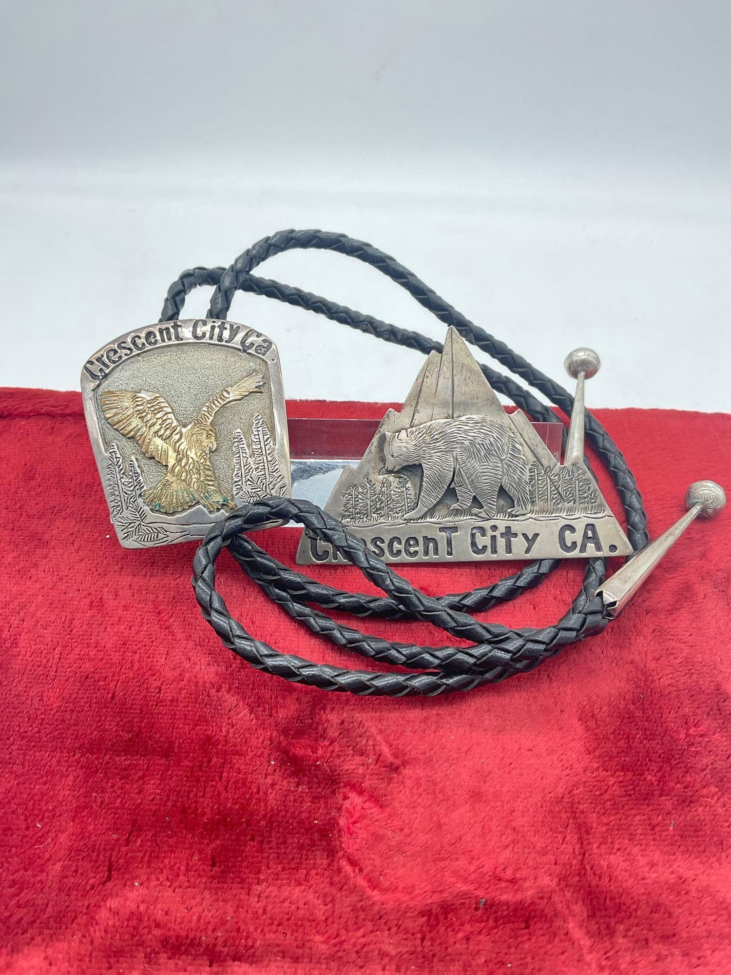 Navajo Randy Shorty Sterling Silver Bolo w/ Gold plate Eagle & Sterling Bear Pin: c-5320 Nice vintage piece w/ tags on the back One is signed by well respected by Navajo Artis Randy Shorty the other one is atributed to him, nice set Bolo Is 2 x 1.5" 