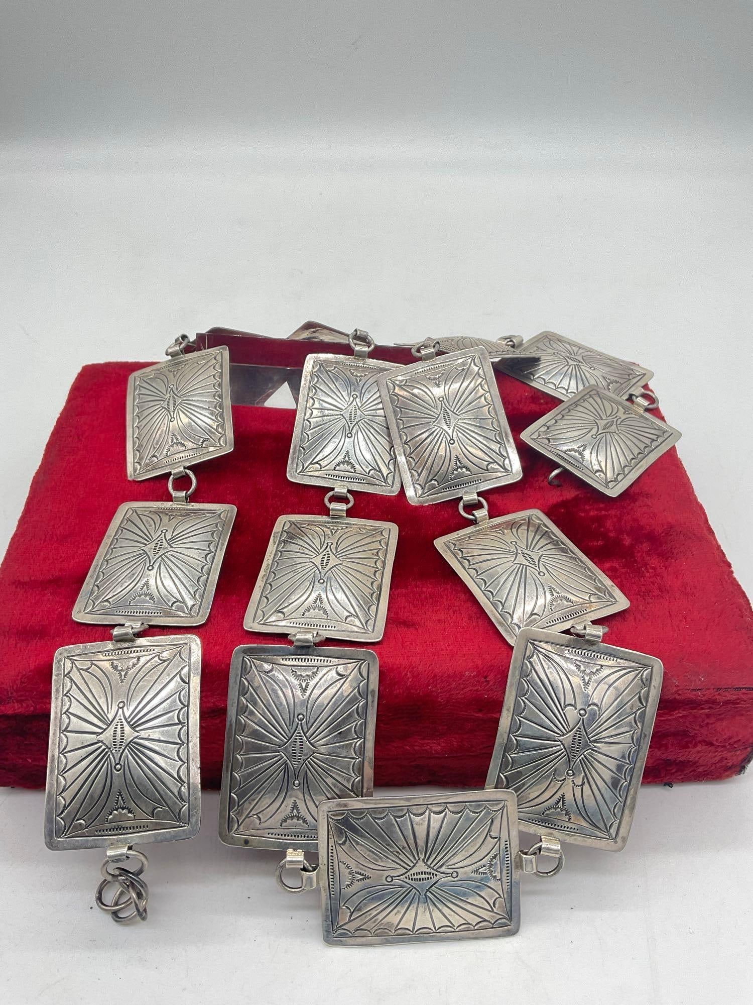 Women's Signed Sterling silver 38" Conch Belt Signed by Renowned Navajo Artist Tony Guerro: c-5320 Each Concho is signed and is 2x 1/12 " total Weight approx. 203.57 grams About the artist The Late Tony Guerro was considered by many to be one of the world's